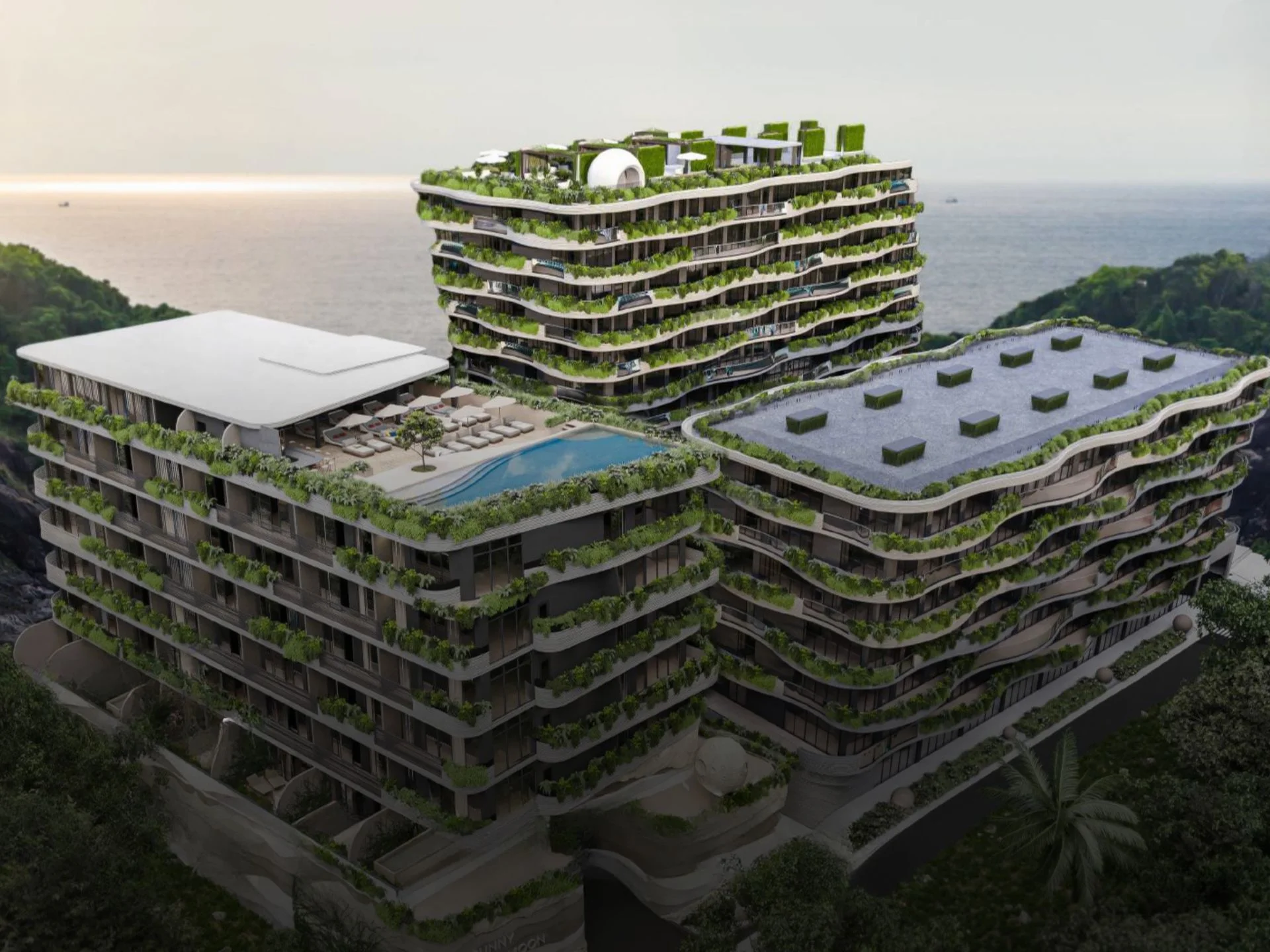 Architecture of Sunny Moon complex with green terraces and sea view, Thailand