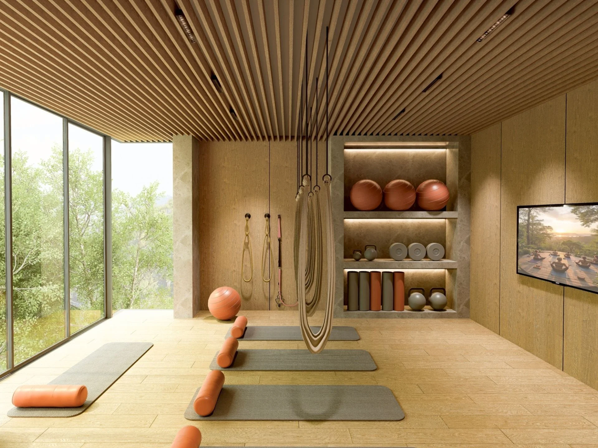 Fitness studio s jogínskou podložkou a vybavením v hotelu Aceller Hotel & Residence, Thajsko