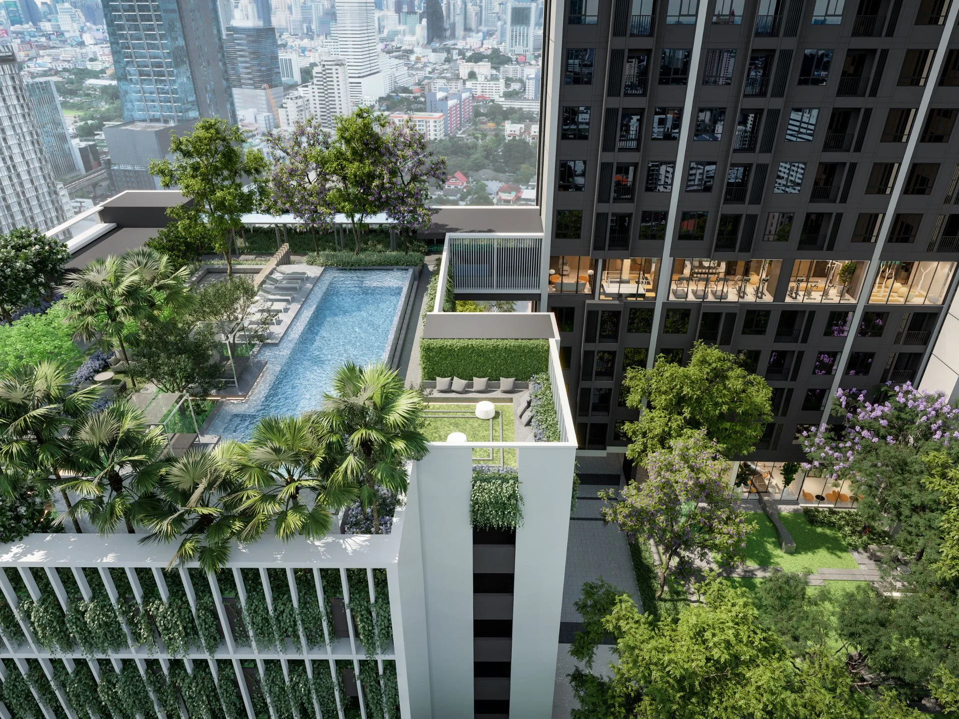 Rooftop swimming pool and landscaped gardens at Nue Evo Ari, Bangkok