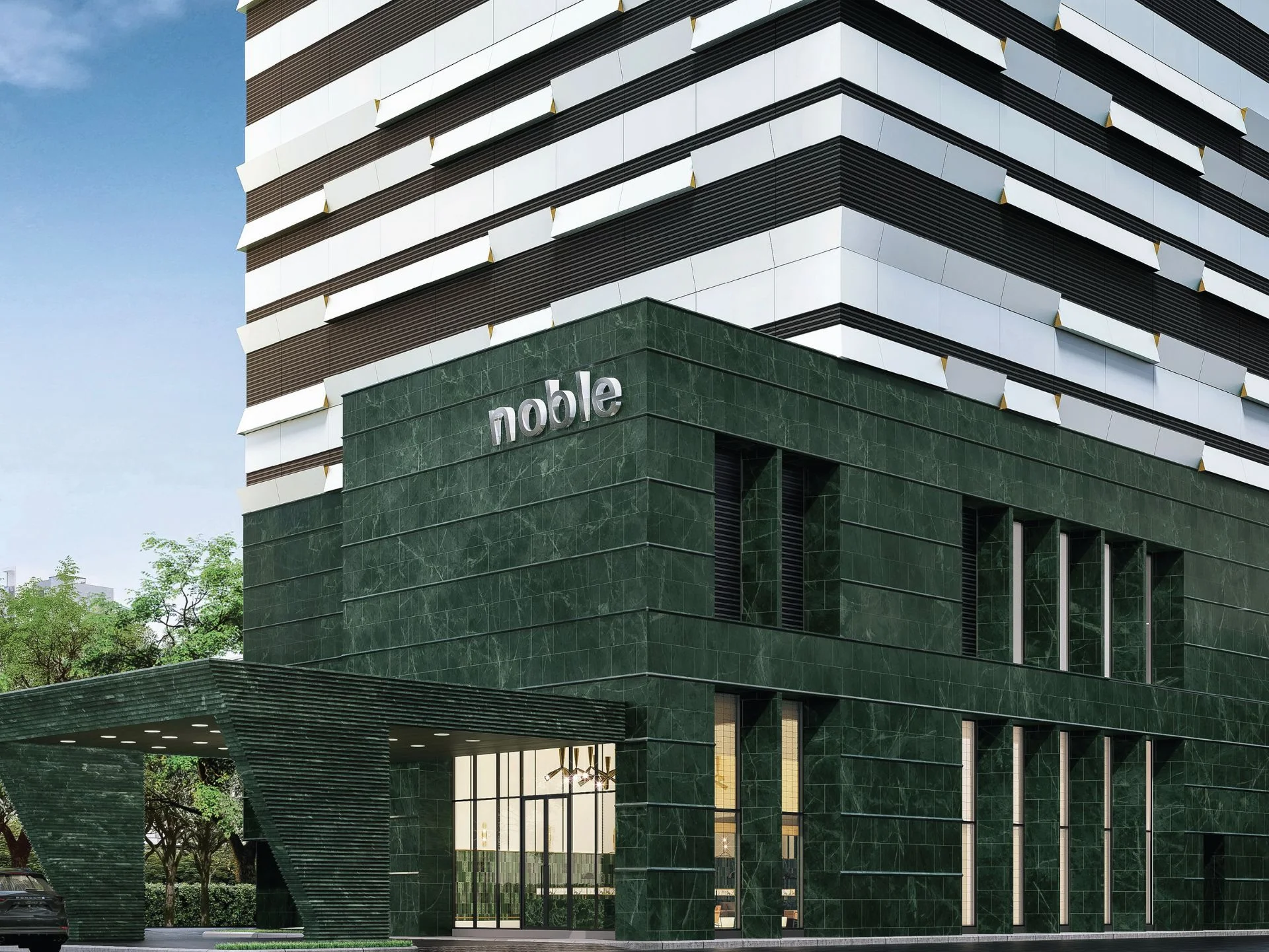 Arquitectura de residencia Noble Form Thonglor con entrada de mármol verde, Bangkok