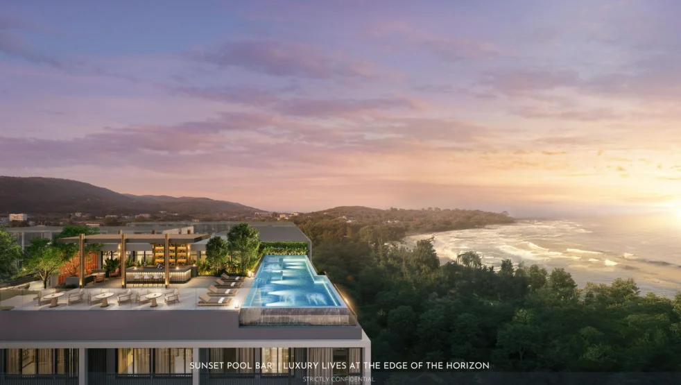 Sunset pool bar and infinity pool at Origin Residences overlooking Kamala Bay, Thailand