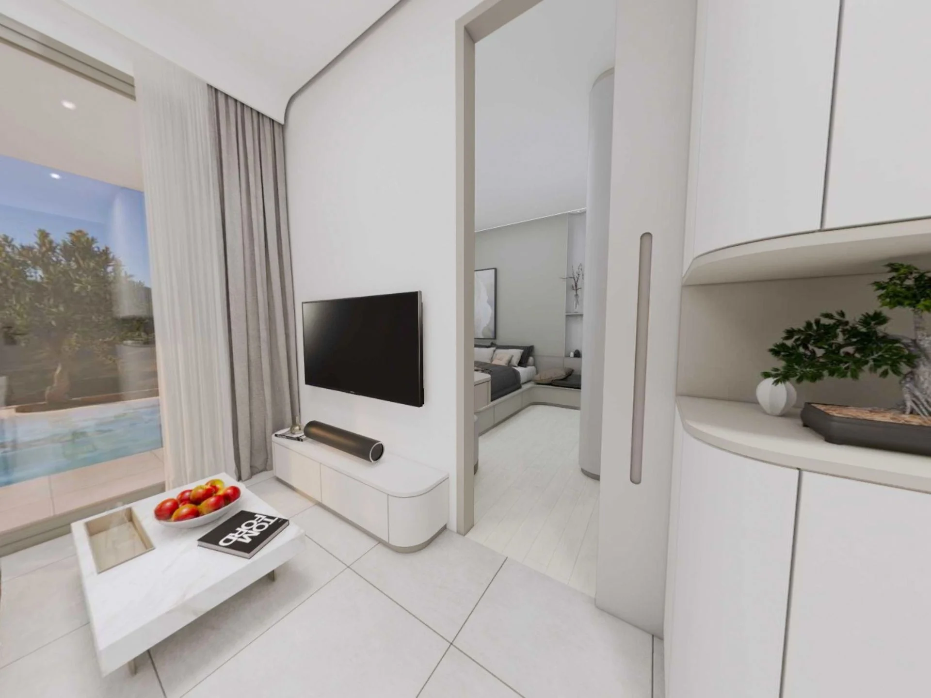 Wohnzimmerinterieur mit TV-Wand in 1-Zimmer-Wohnung im The Element Kamala, Thailand