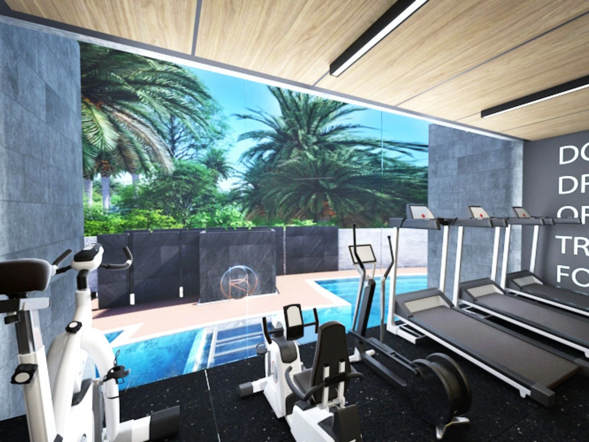Centro fitness con attrezzature palestra e vista piscina a Bright Phuket, Tailandia