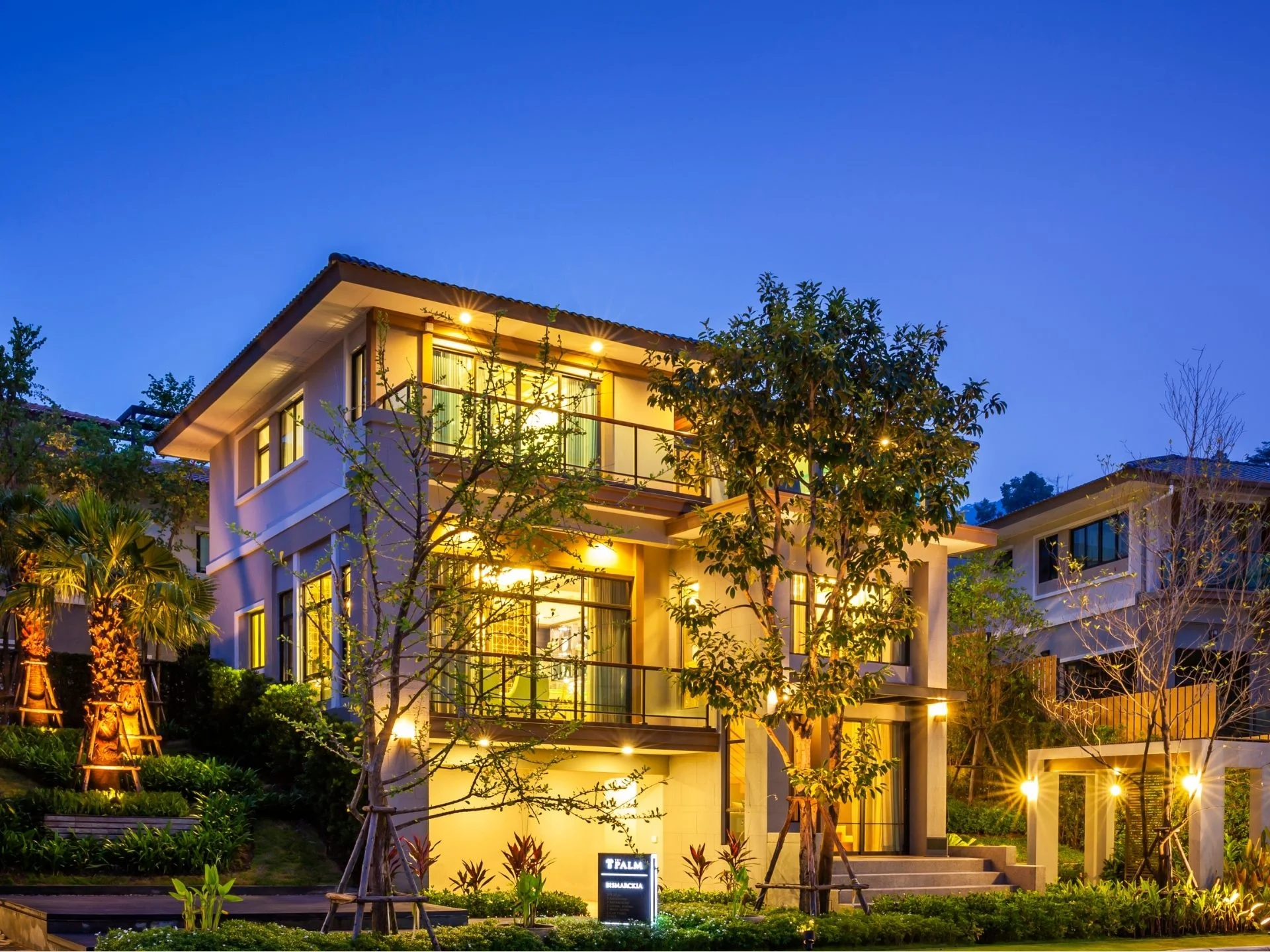 Architecture of The Palm Kathu-Patong residence at dusk, Thailand