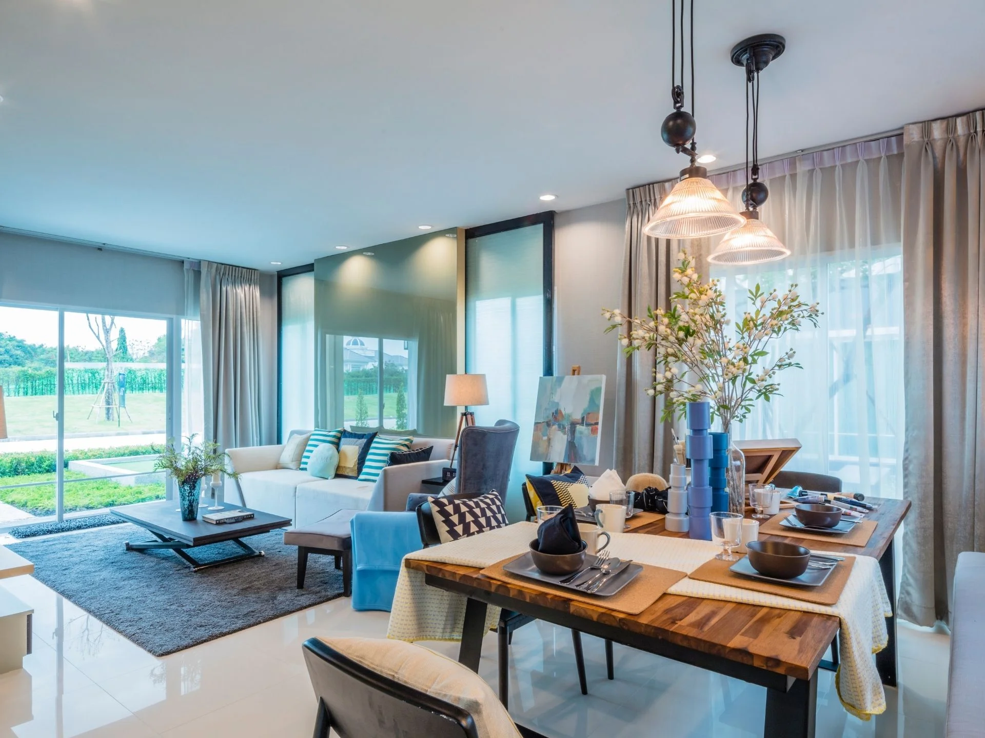 Open-plan living and dining area with garden view at The Plant Pruksa Thalang, Thailand
