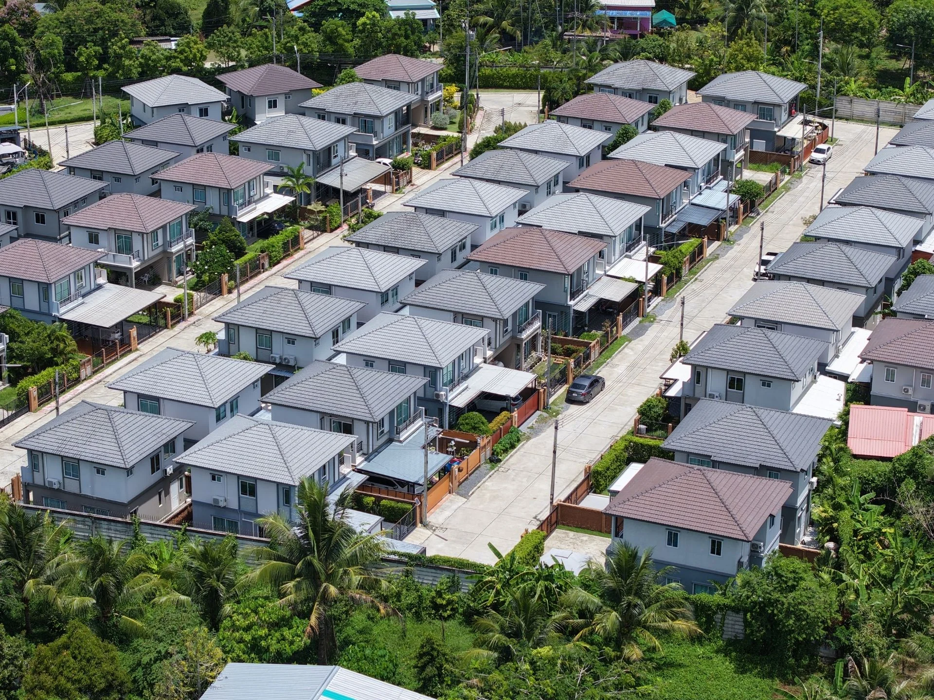 Aerial view of The Plant Pruksa Thalang residential community with modern villas, Thalang