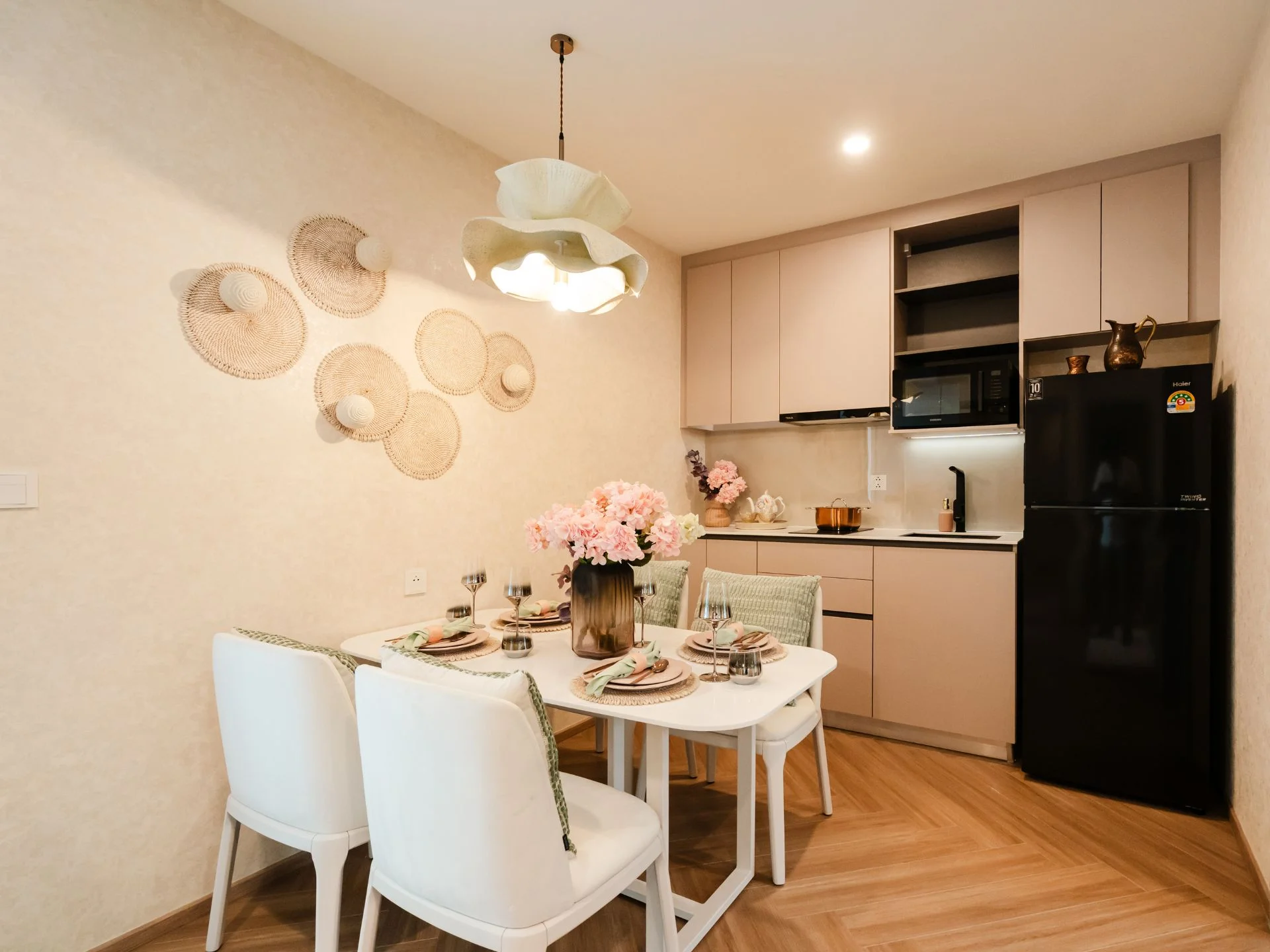 Kitchen and dining area interior in 2-bedroom apartment at The Title Coralina, Kamala