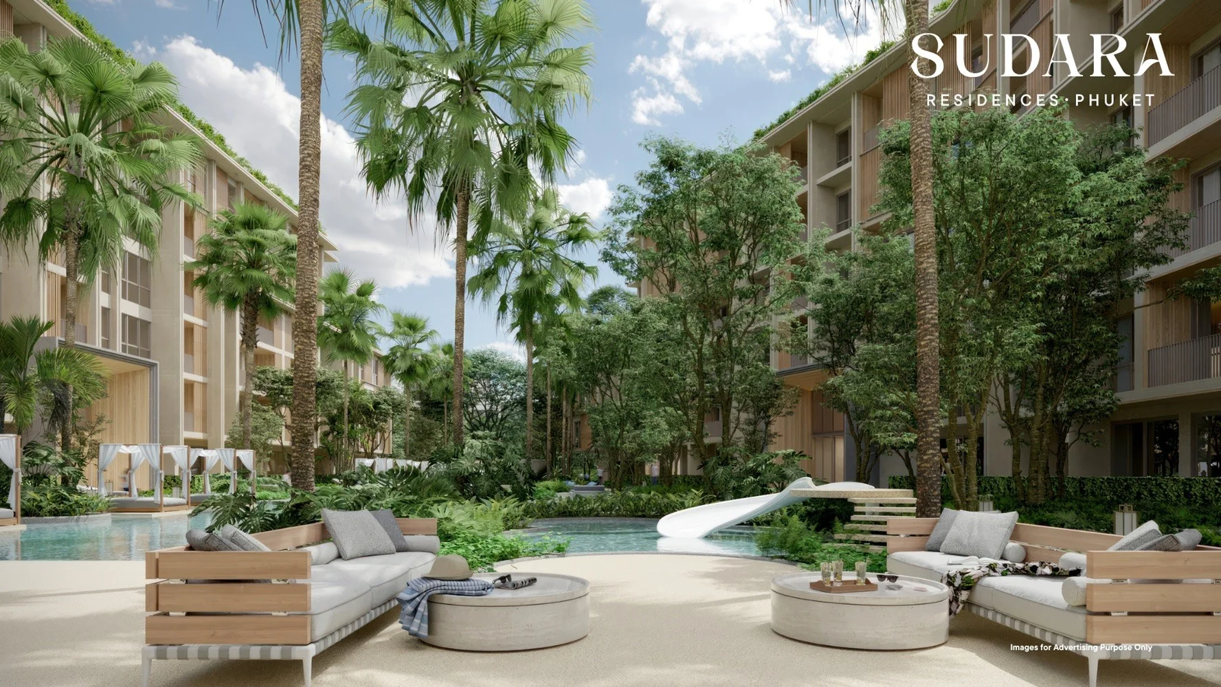 Landscaped courtyard with pool and lounge areas at Sudara Residences, Phuke