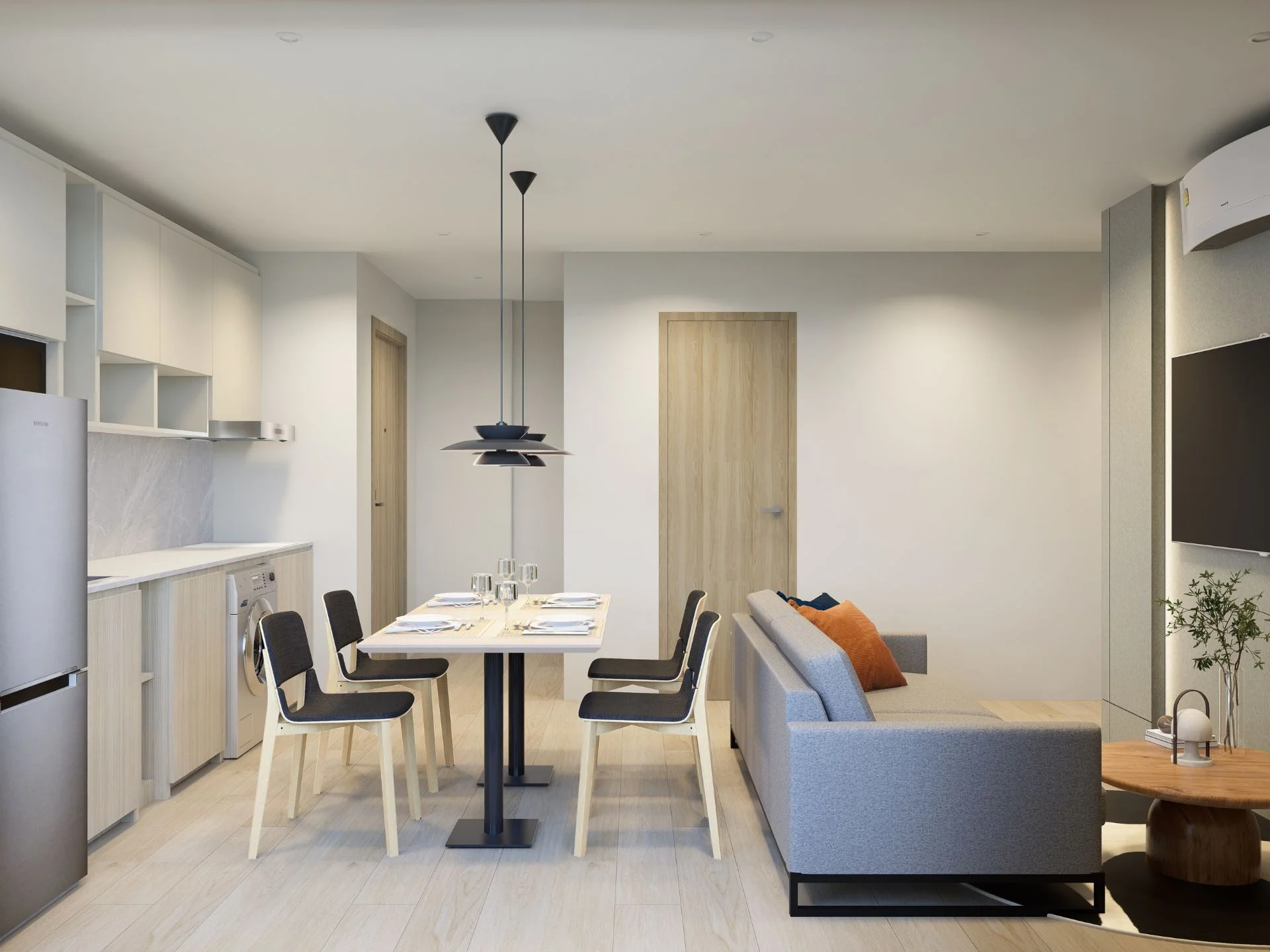 Open-plan living and dining area with kitchen in a 2-bedroom apartment at Sea Heaven Nai Thon, Thailand