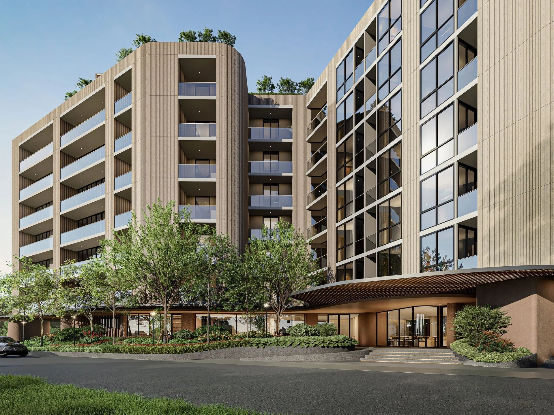 Architecture of The Zero Bang Tao apartments with contemporary facade and landscaped entrance, Bang Tao