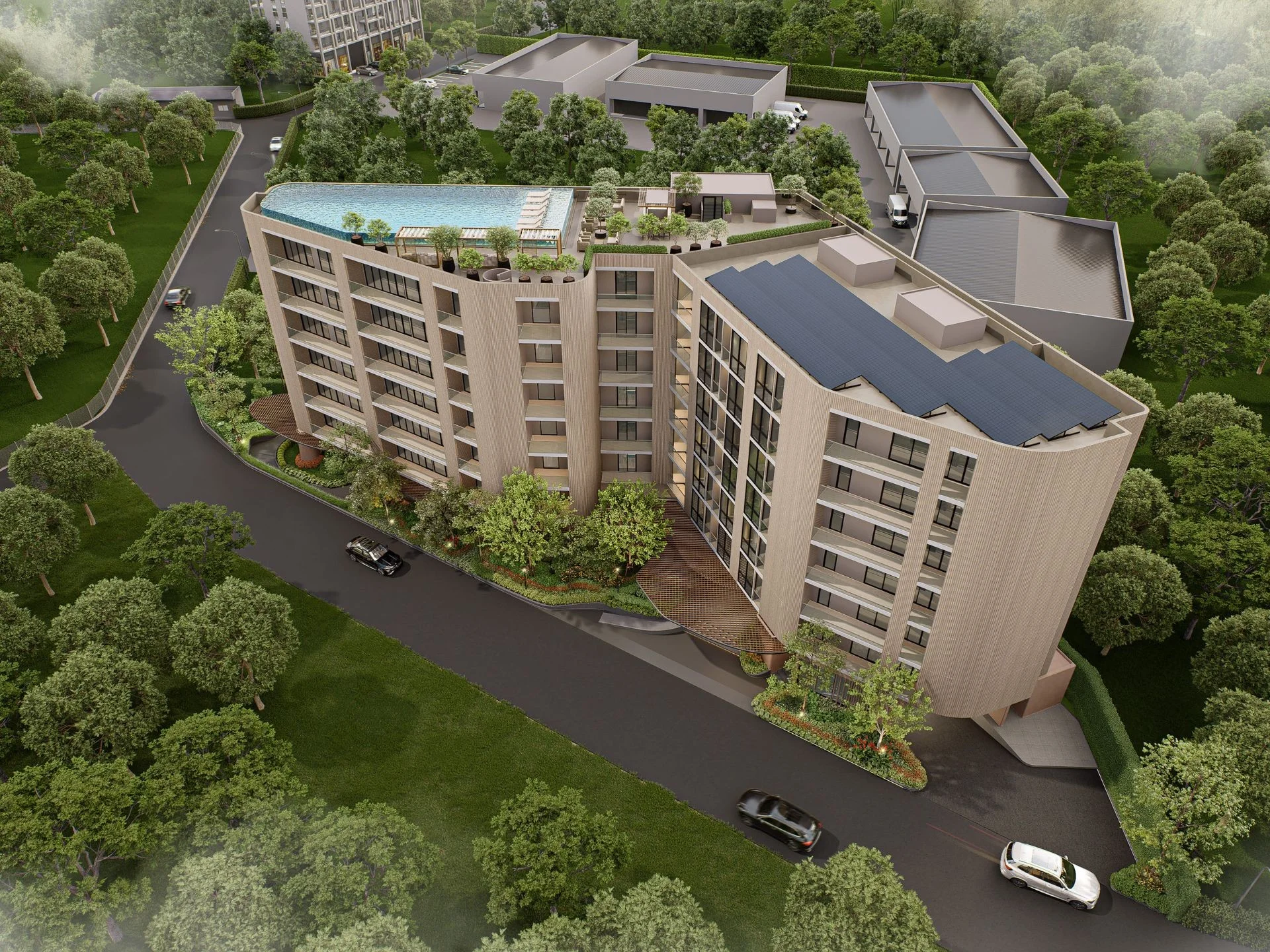Aerial view of The Zero Bang Tao apartment complex with rooftop pool, Bang Tao