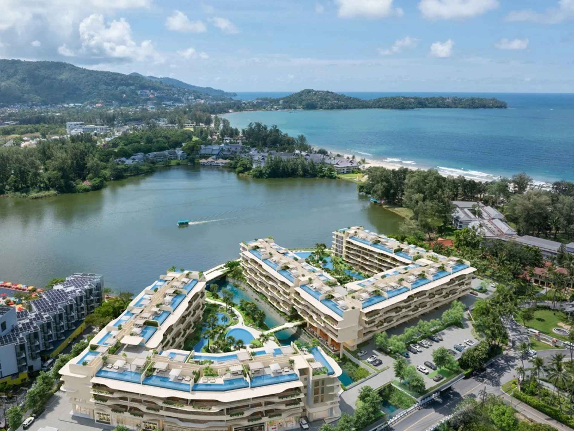 Aerial view of Laguna Beach Residences Bayside complex with lagoon and sea, Thailand
