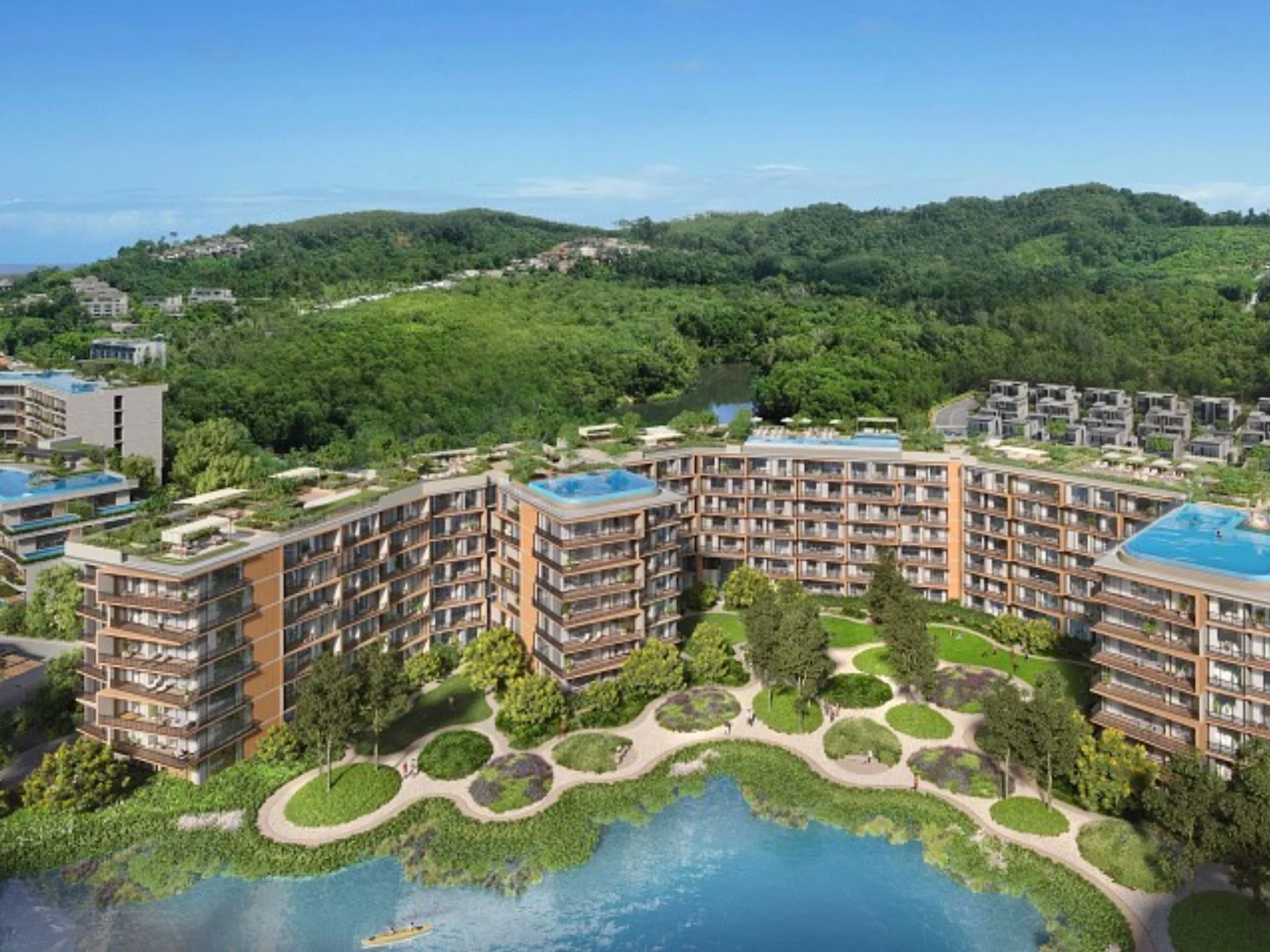 Aerial view of Laguna Skypark Elara residential complex with rooftop pools and landscaped grounds, Thailand