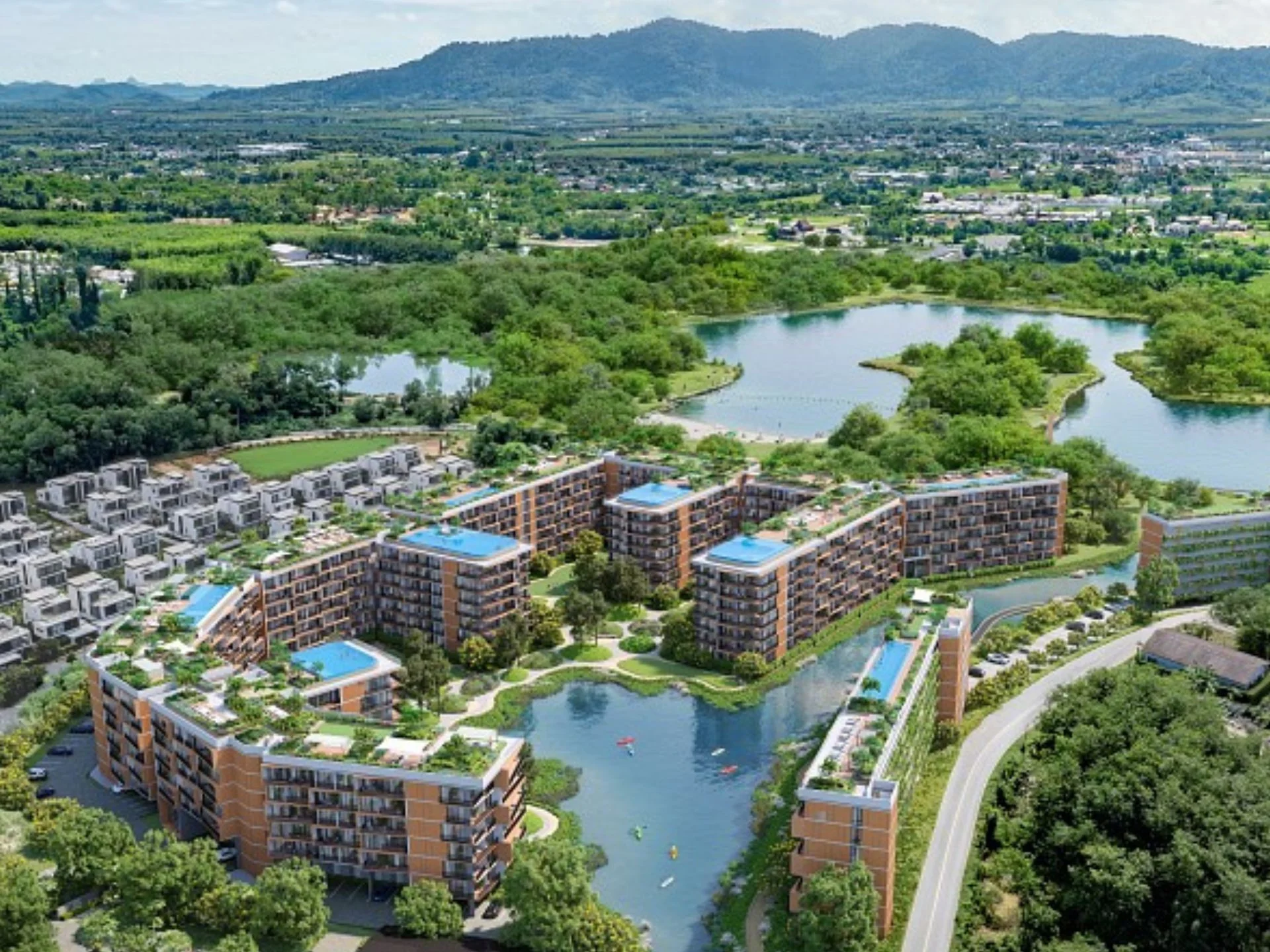 Aerial view of Laguna Skypark Elara residential complex with lakeside architecture, Thailand
