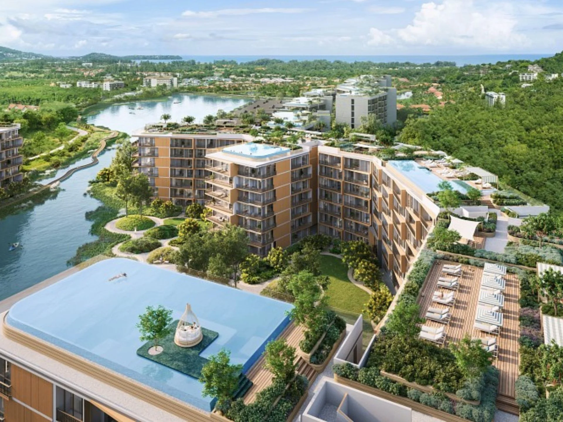 Aerial view of Laguna Skypark Elara residential complex with rooftop pool and river landscape, Thailand