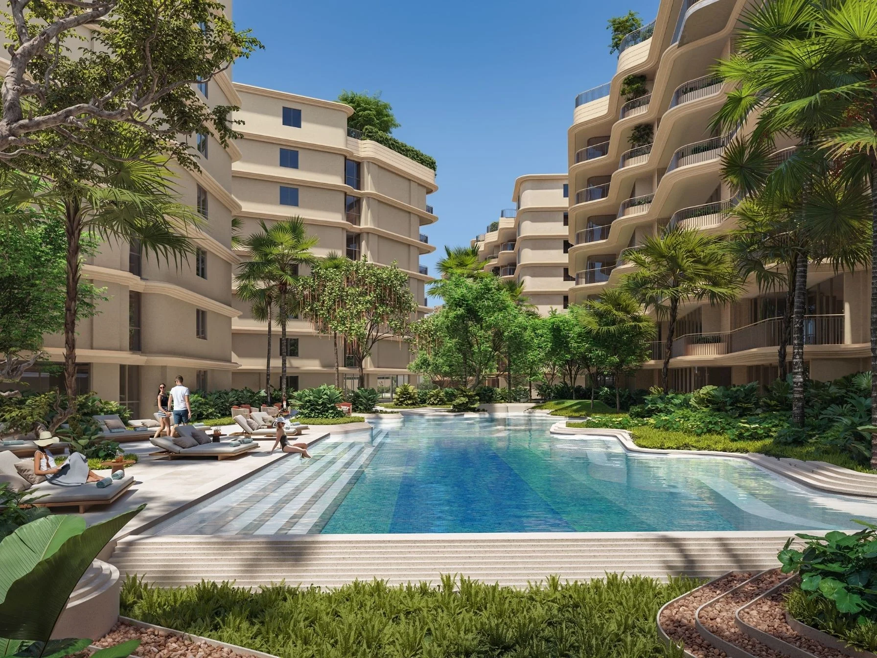 Piscina y patio ajardinado en Bellaguna Golf Residences Hibiscus, Tailandia