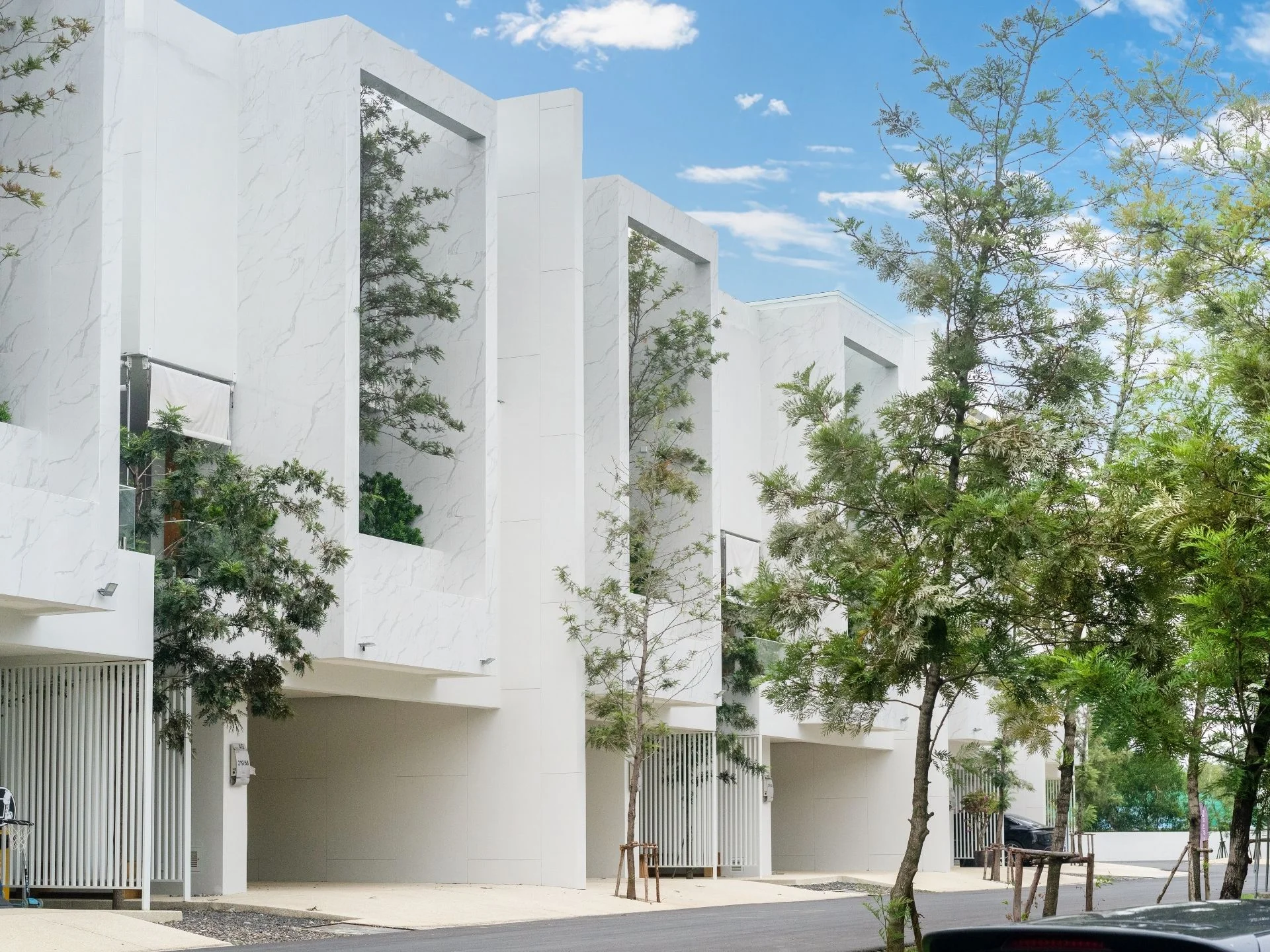 Modern architecture of The Residence villa complex with integrated landscaping, Bang Tao