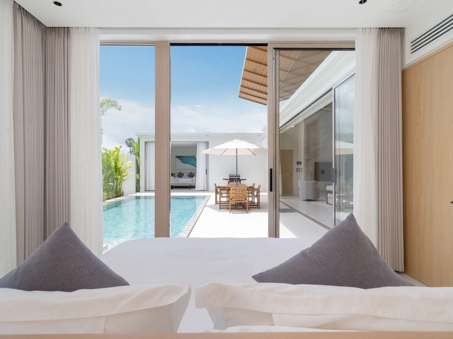 Bedroom with pool and terrace view at The Residence villa, Bang Tao