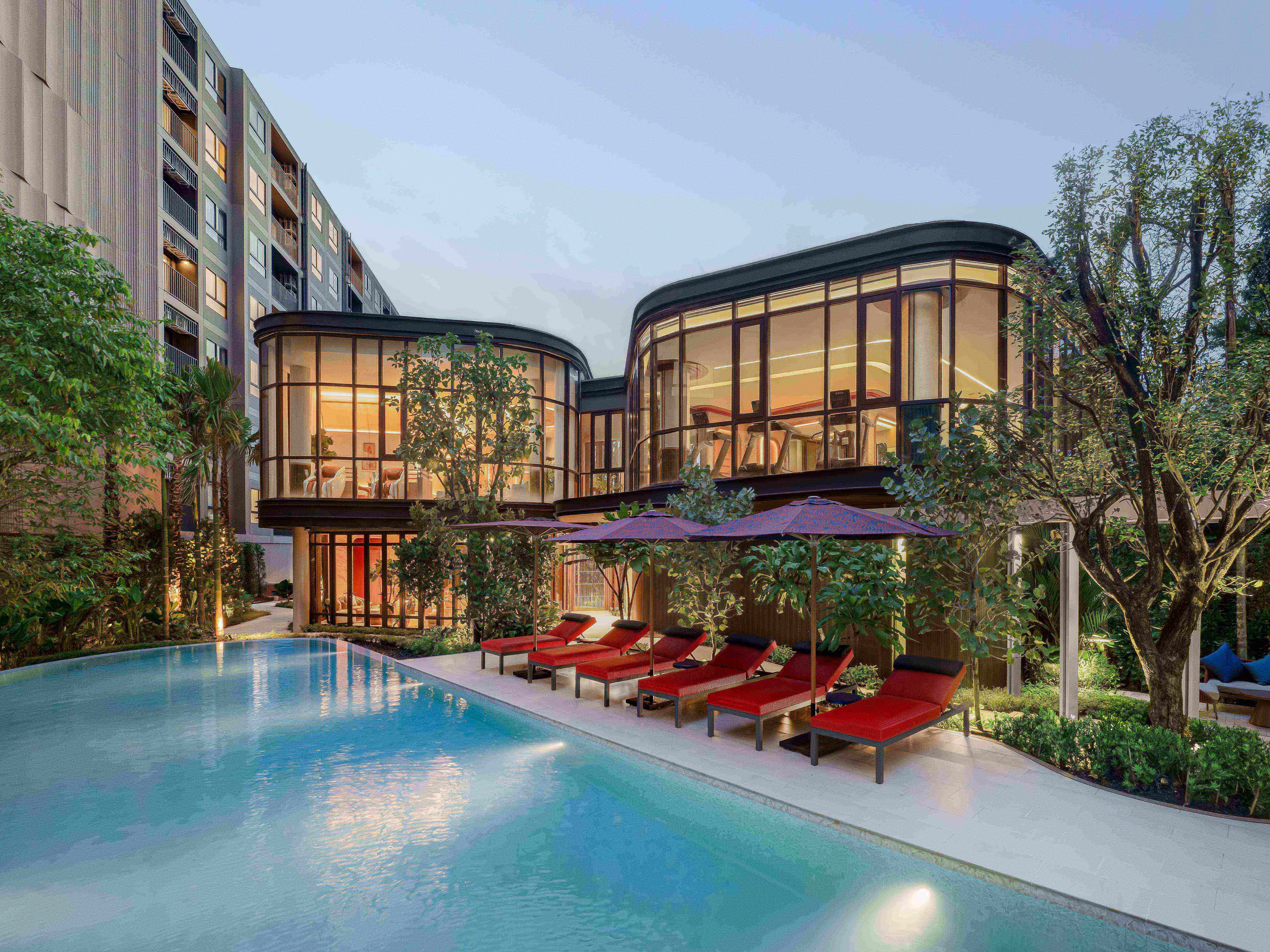 Swimming pool and lounge area at The Base Cherngtalay, Chengthalay