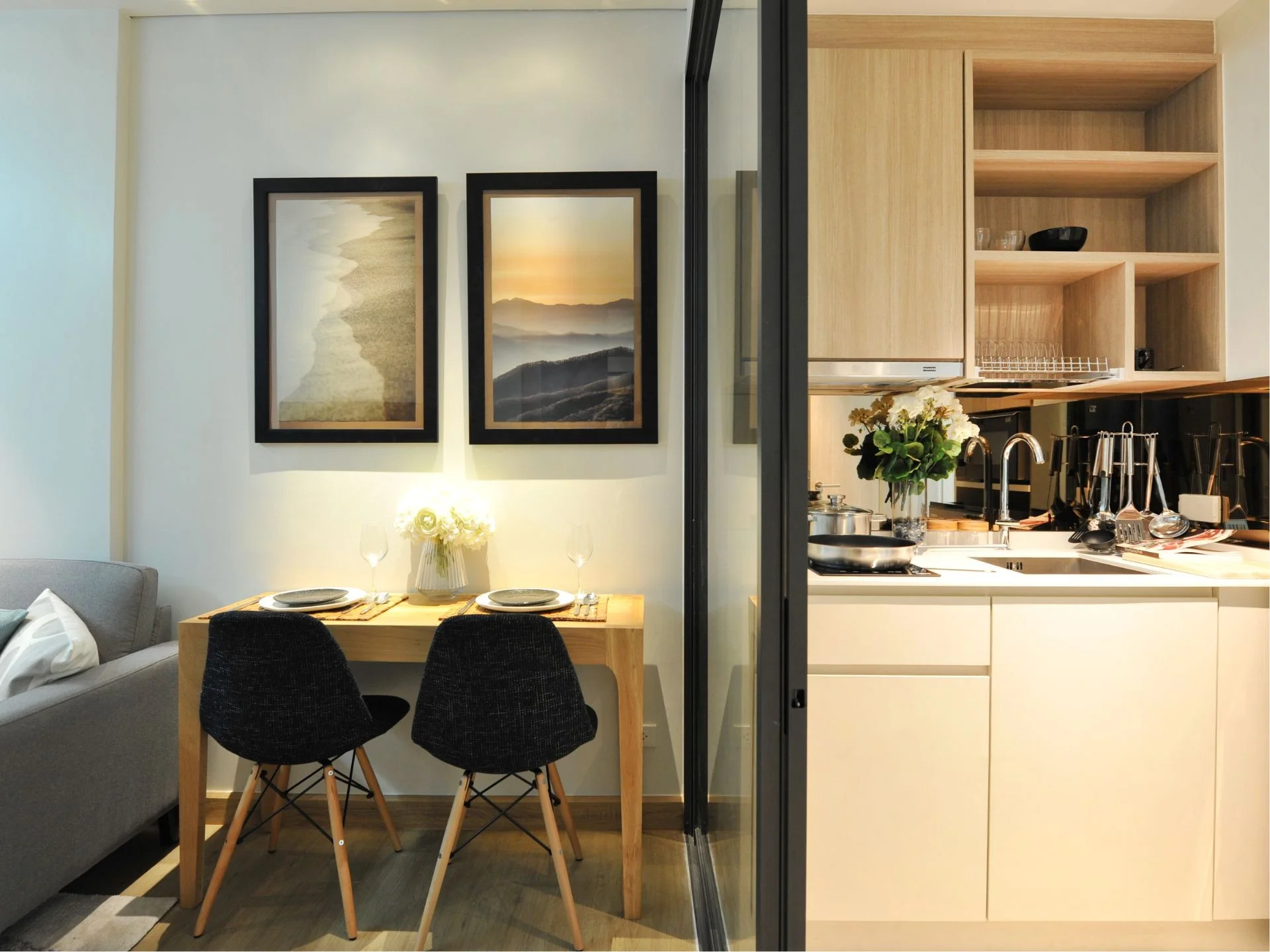 Kitchen and dining area interior in 1-bedroom apartment at Laguna Skypark Celeste, Bang Tao