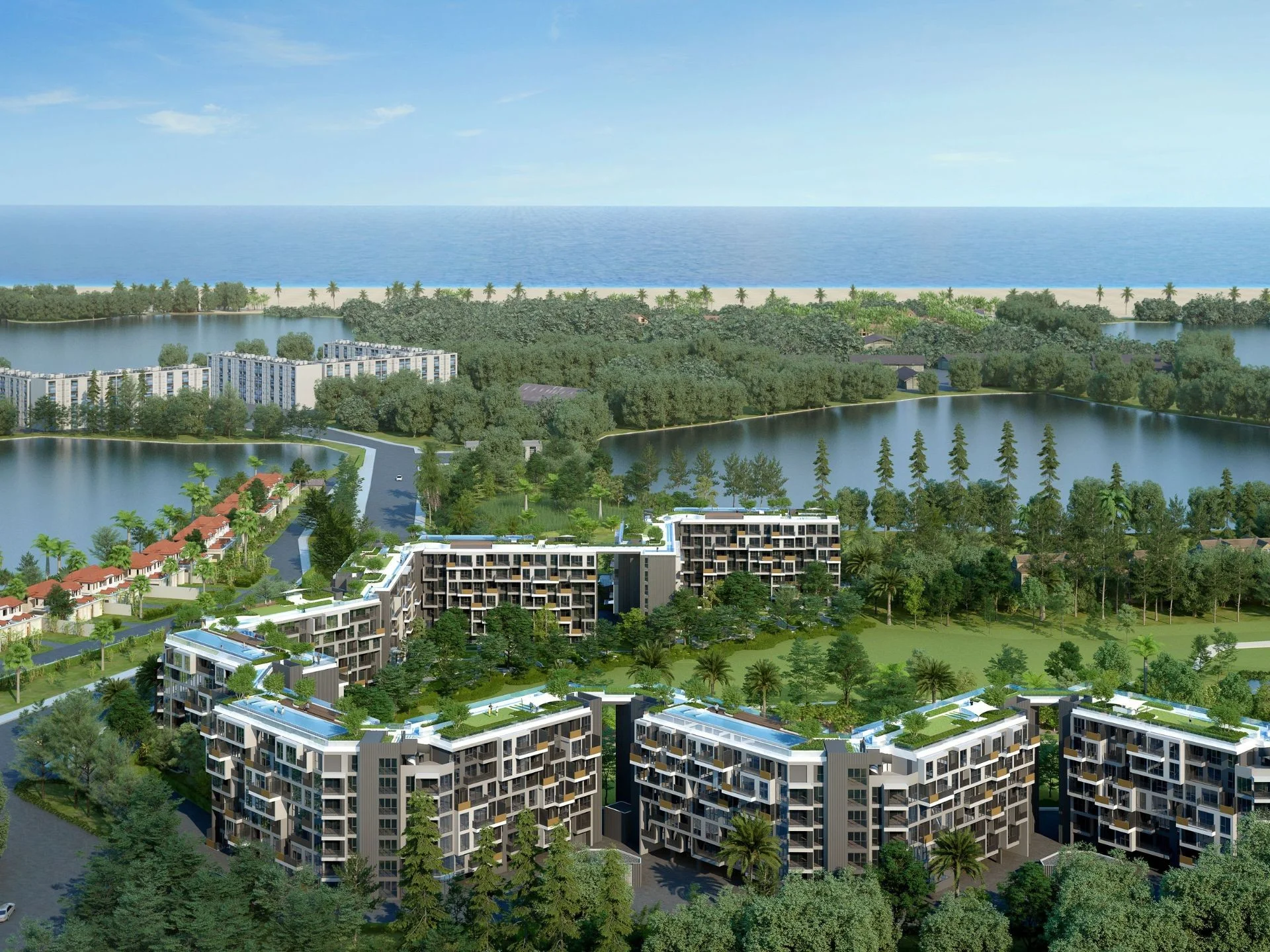 Aerial view of Laguna Skypark Celeste residential complex with lakes and beach, Bang Tao