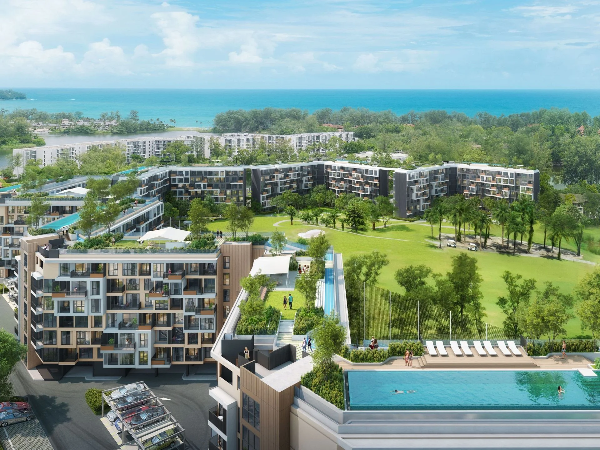 Aerial view of Laguna Skypark Celeste resort with swimming pool, landscaped grounds and sea view, Bang Tao