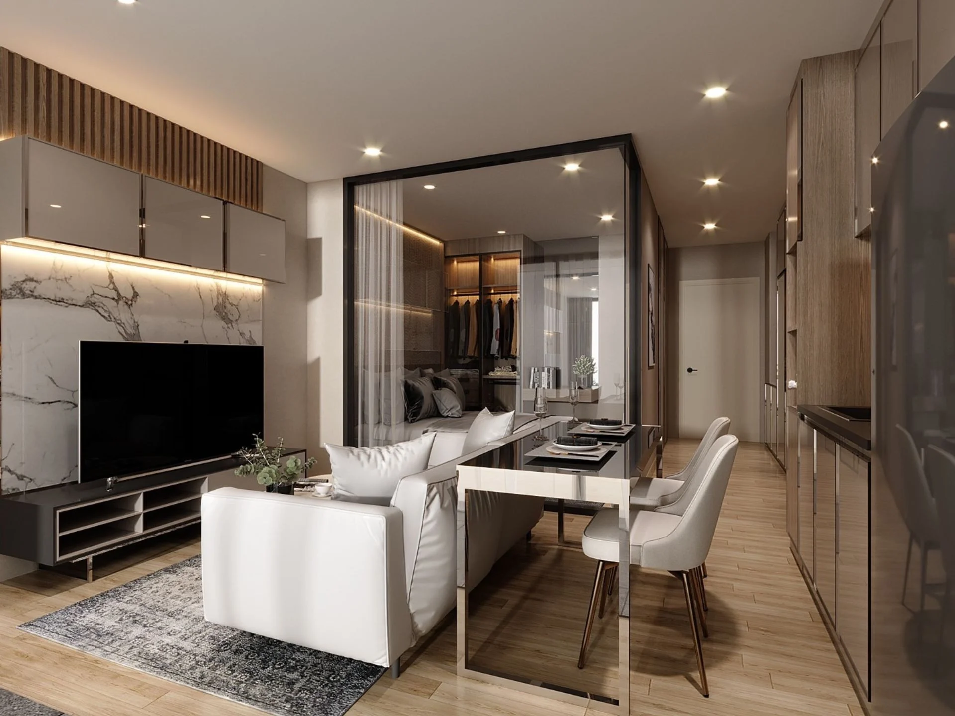 Living room and bedroom interior in 1-bedroom apartment at The Balance Kata, Thailand