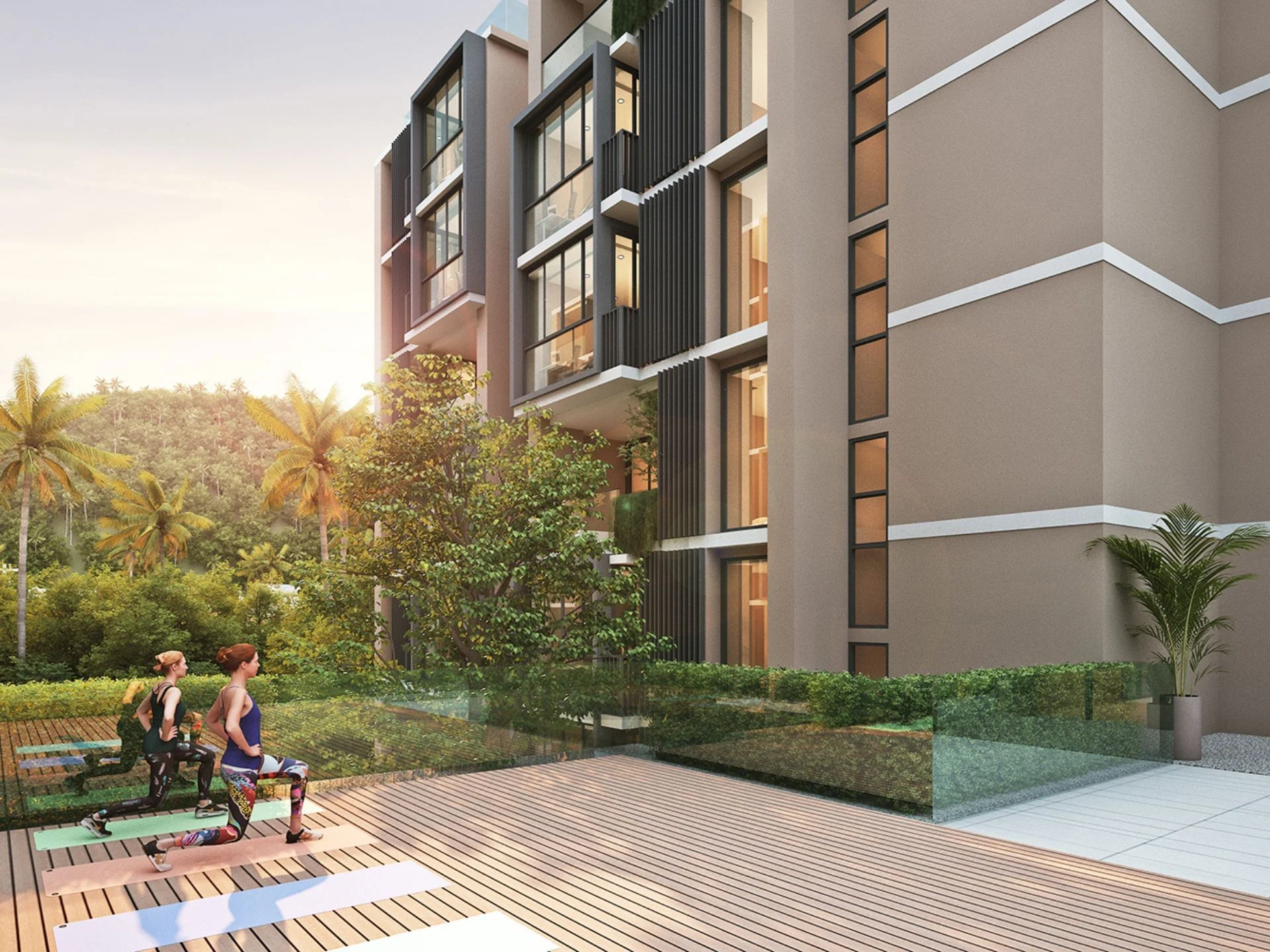 Outdoor fitness area with wooden deck at The Balance Kata, Thailand