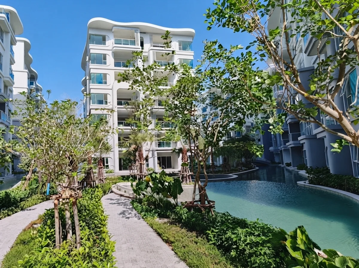 Landscaped courtyard with swimming pool at The Title Serenity, Nai Yang