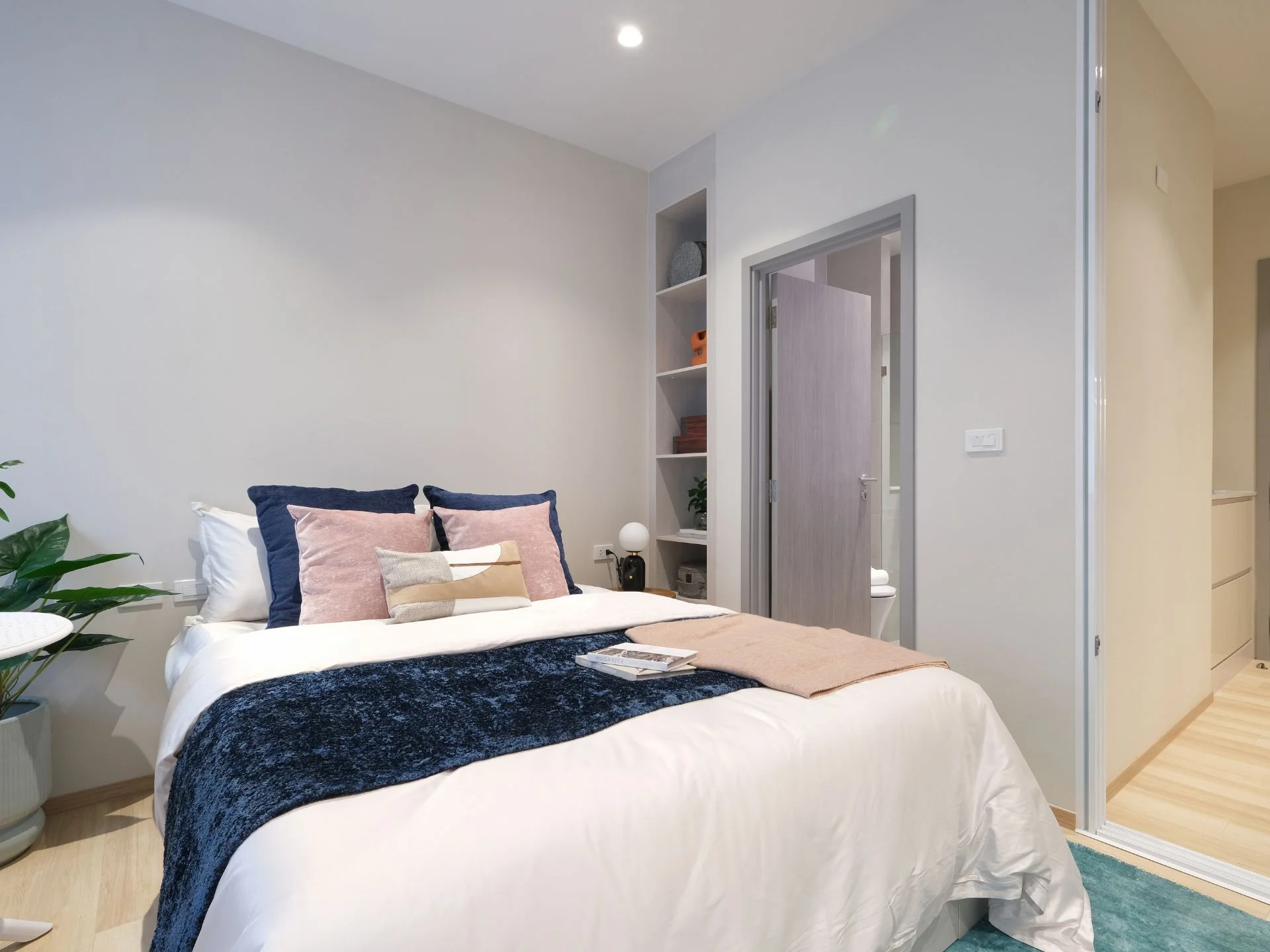 Bedroom interior in a studio apartment at The Title Serenity, Nai Yang