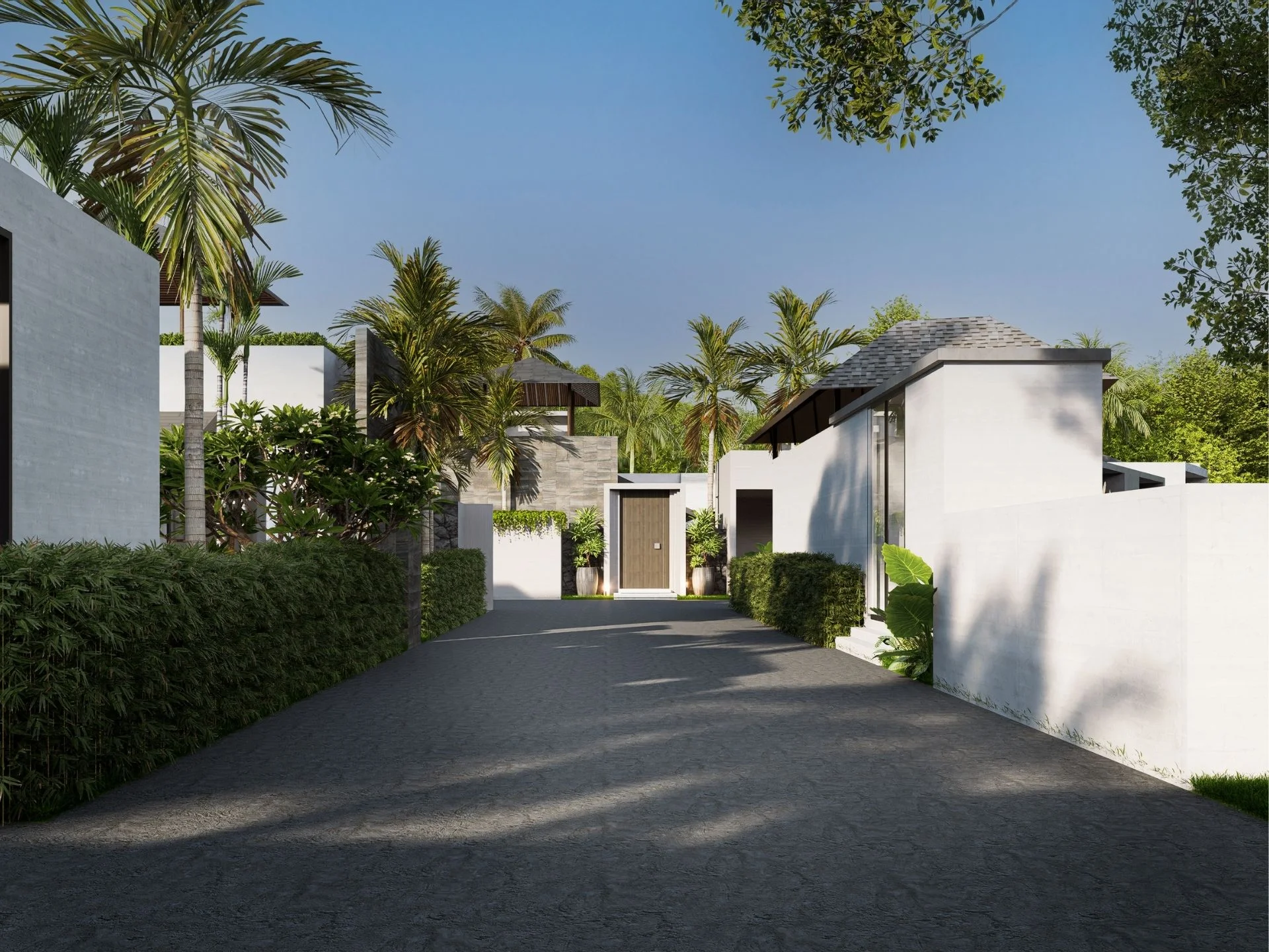Fortuna Lakeside villa complex architecture with landscaped entrance and palm trees, Thailand