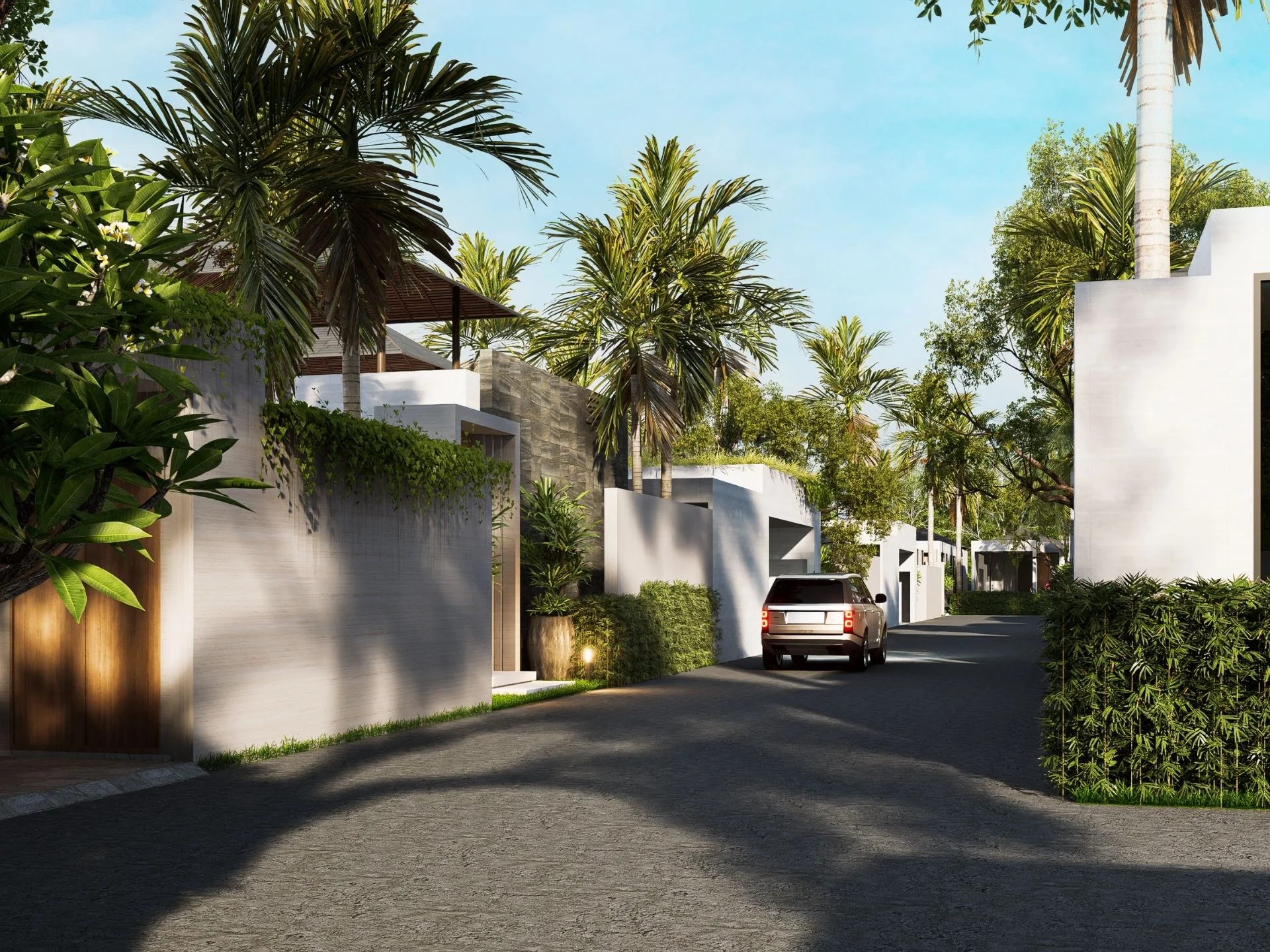 Fortuna Lakeside residential complex with modern white villas and tropical landscaping, Thailand