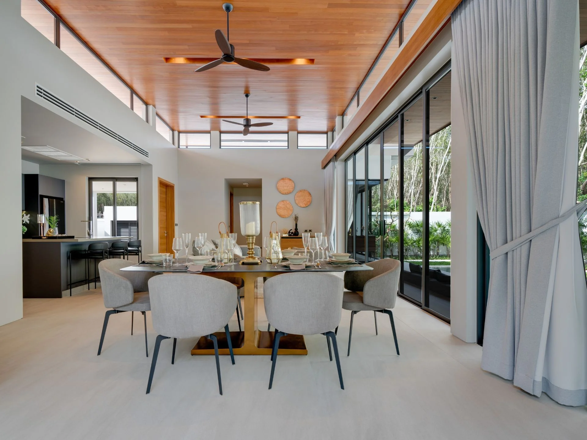 Dining area with garden view in 3-bedroom villa at Botanica Four Seasons, Laya