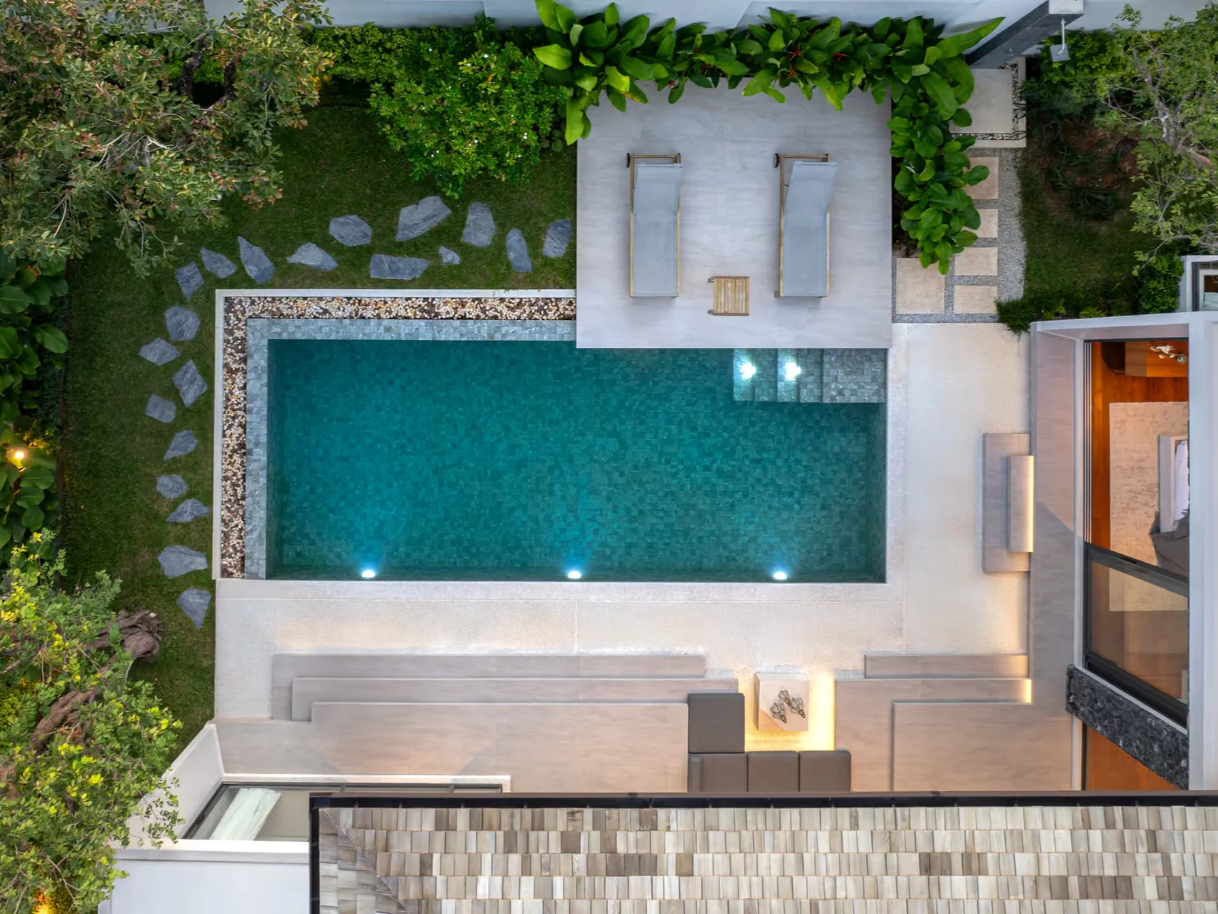 Aerial view of swimming pool and landscaped courtyard at Botanica Four Seasons villa, Laya