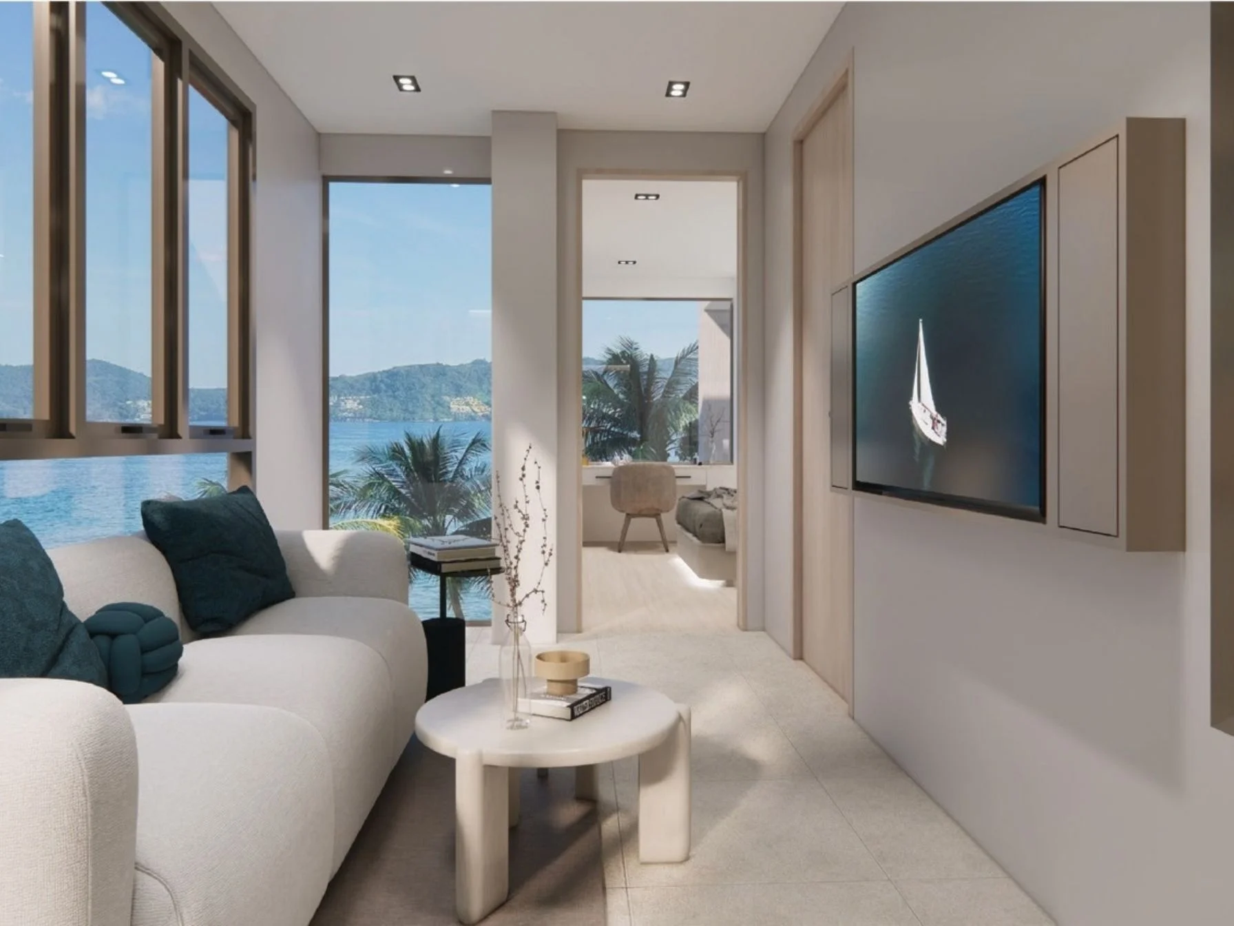Living room interior with sea view in 1-bedroom apartment at Niranda Seaview, Patong