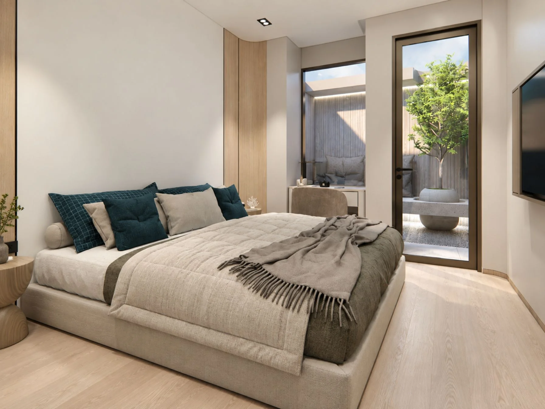 Master bedroom interior with terrace access in 2-bedroom apartment at Niranda Seaview, Patong