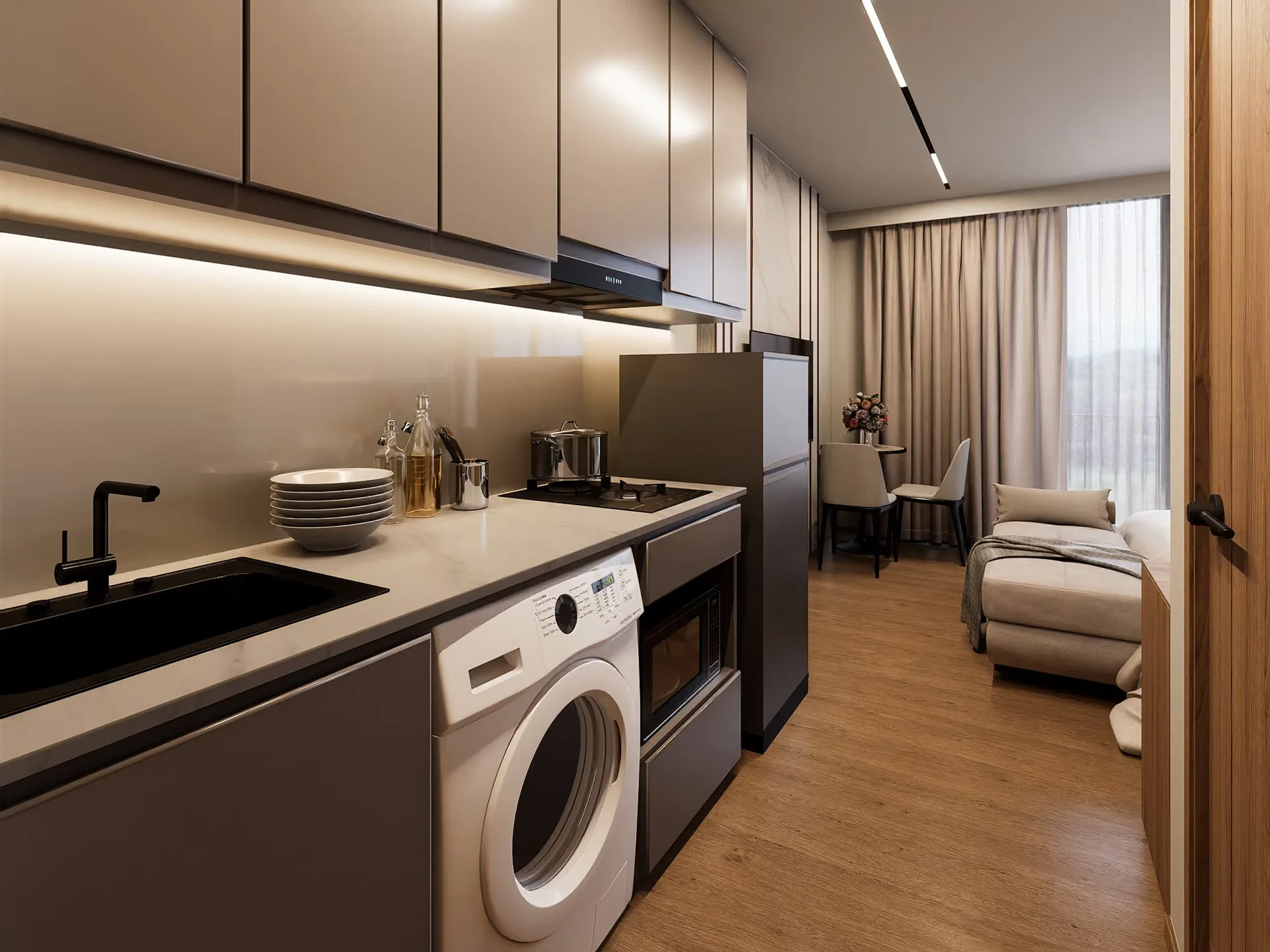 Küchen- und Wohnbereich in einem Studio-Apartment im Vip Space Odyssey, Rawai