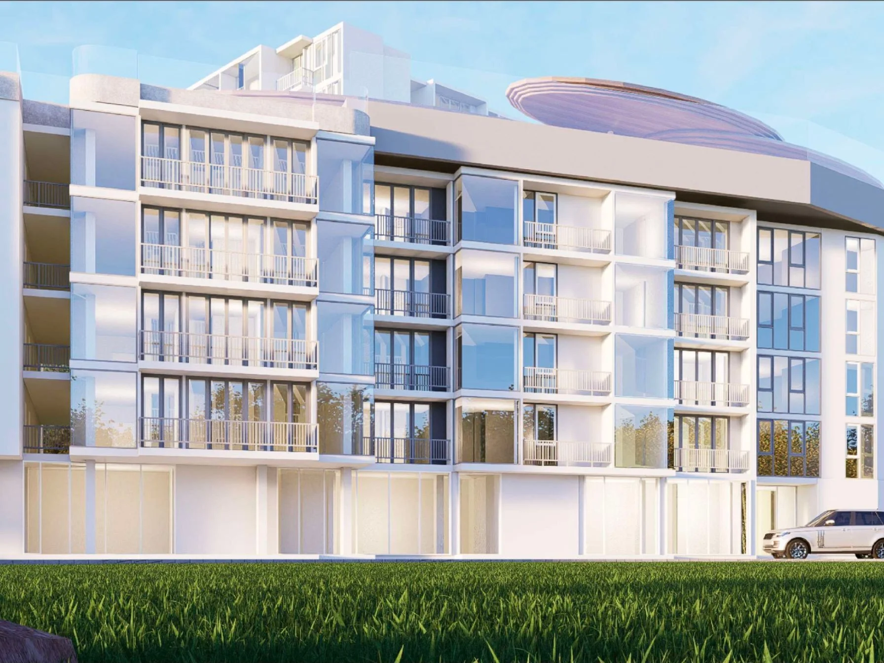 Modern residential complex architecture with curved roofline, Rawai
