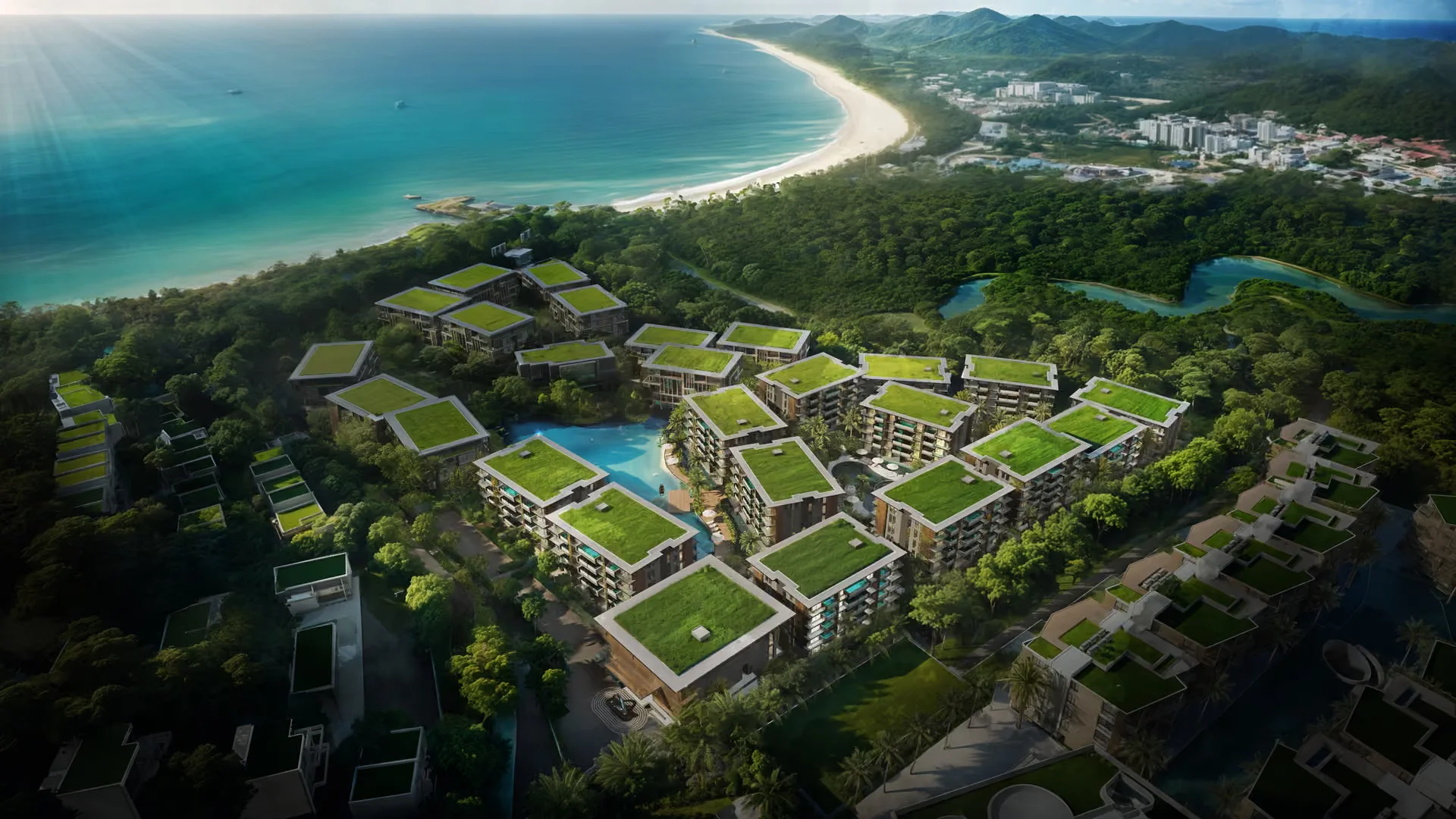 Aerial view of Abov Patong Residence complex with green roofs overlooking Patong Beach, Thailand