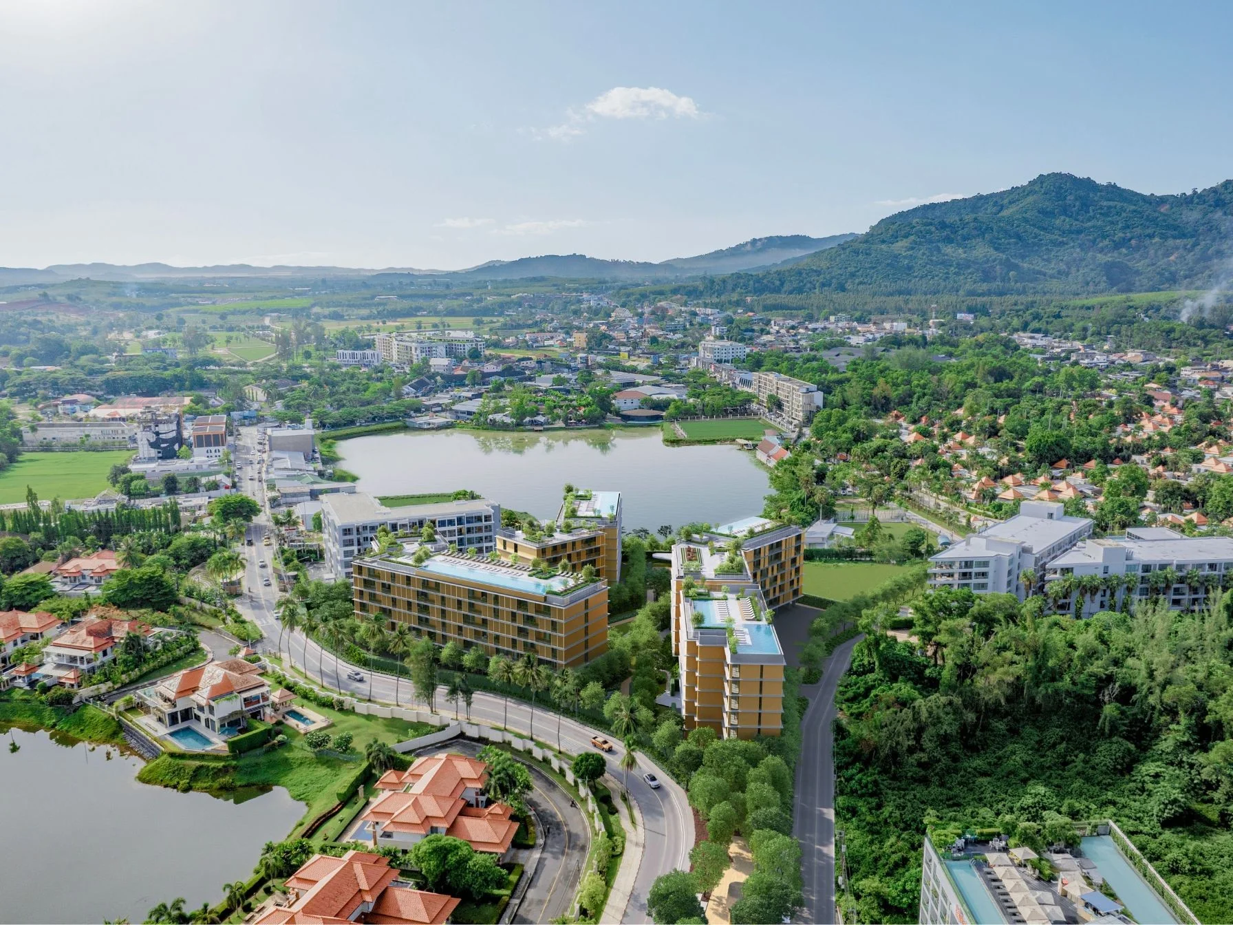 Aerial view of Laguna Lake Residences Aster with lake and mountain landscape, Thailand