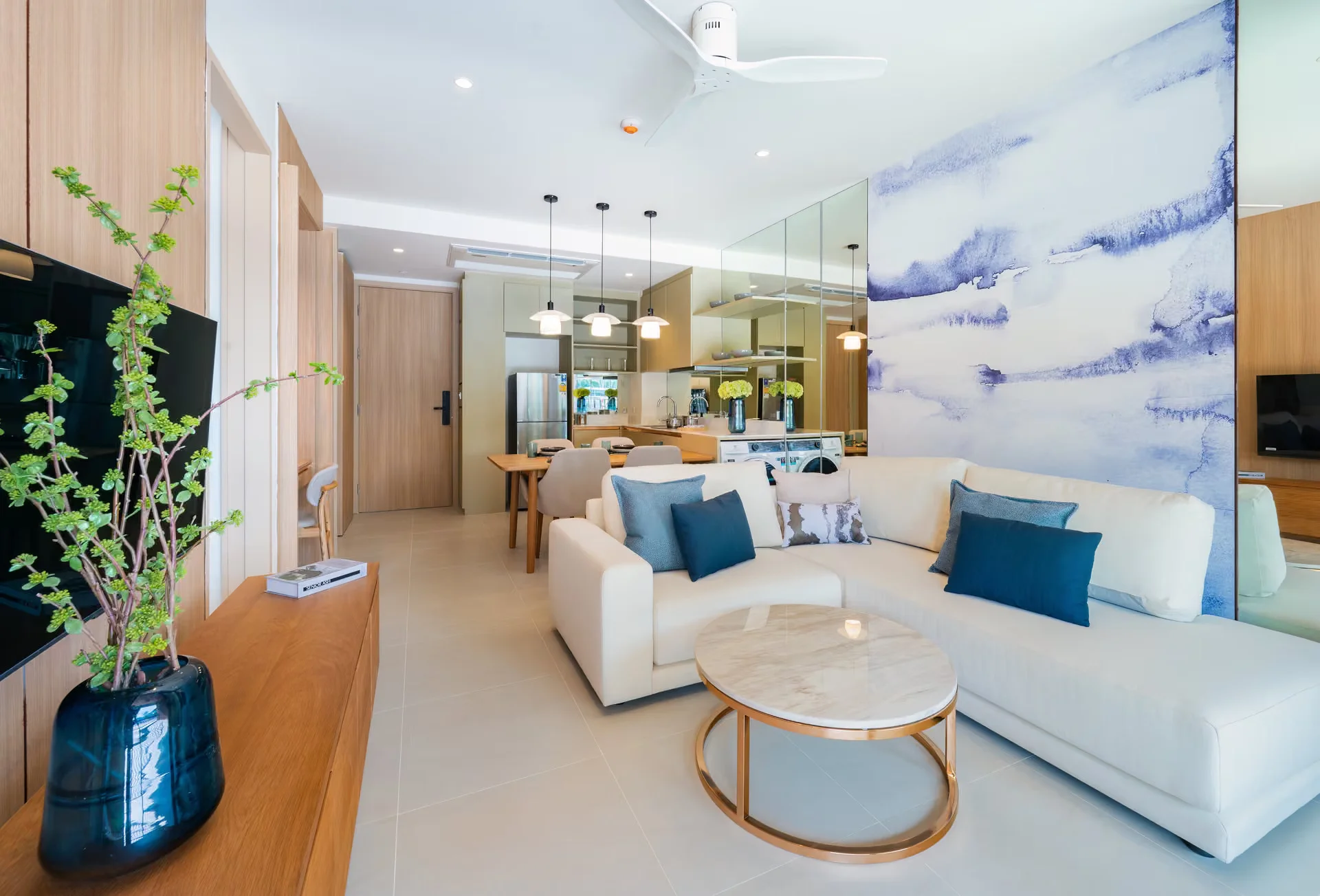 Living room interior in a 1-bedroom apartment at Laguna Lakelands Waterside Residences, Laguna, Thailand