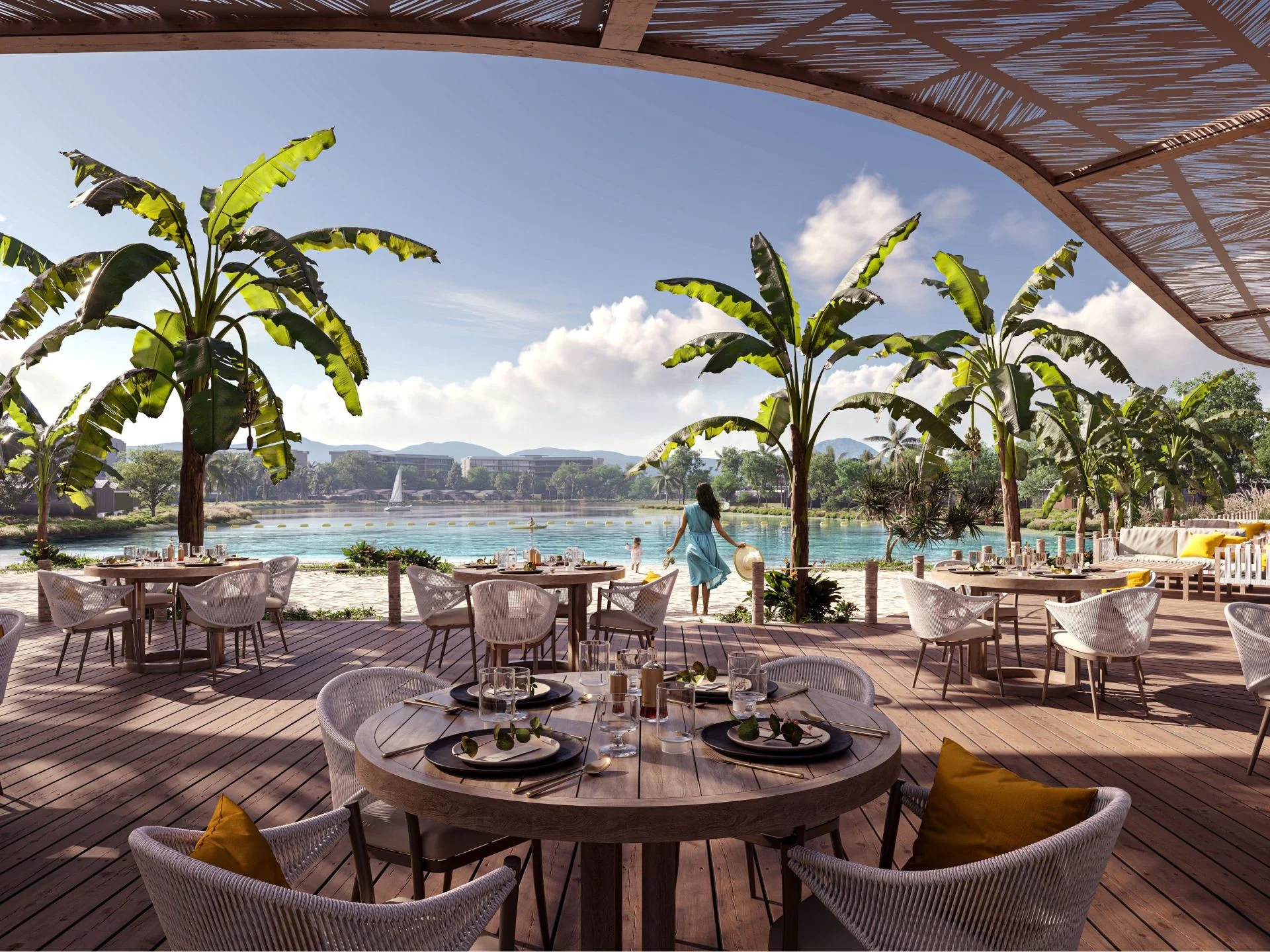 Outdoor dining terrace overlooking the lake at Laguna Lakelands Waterside Residences, Thailand