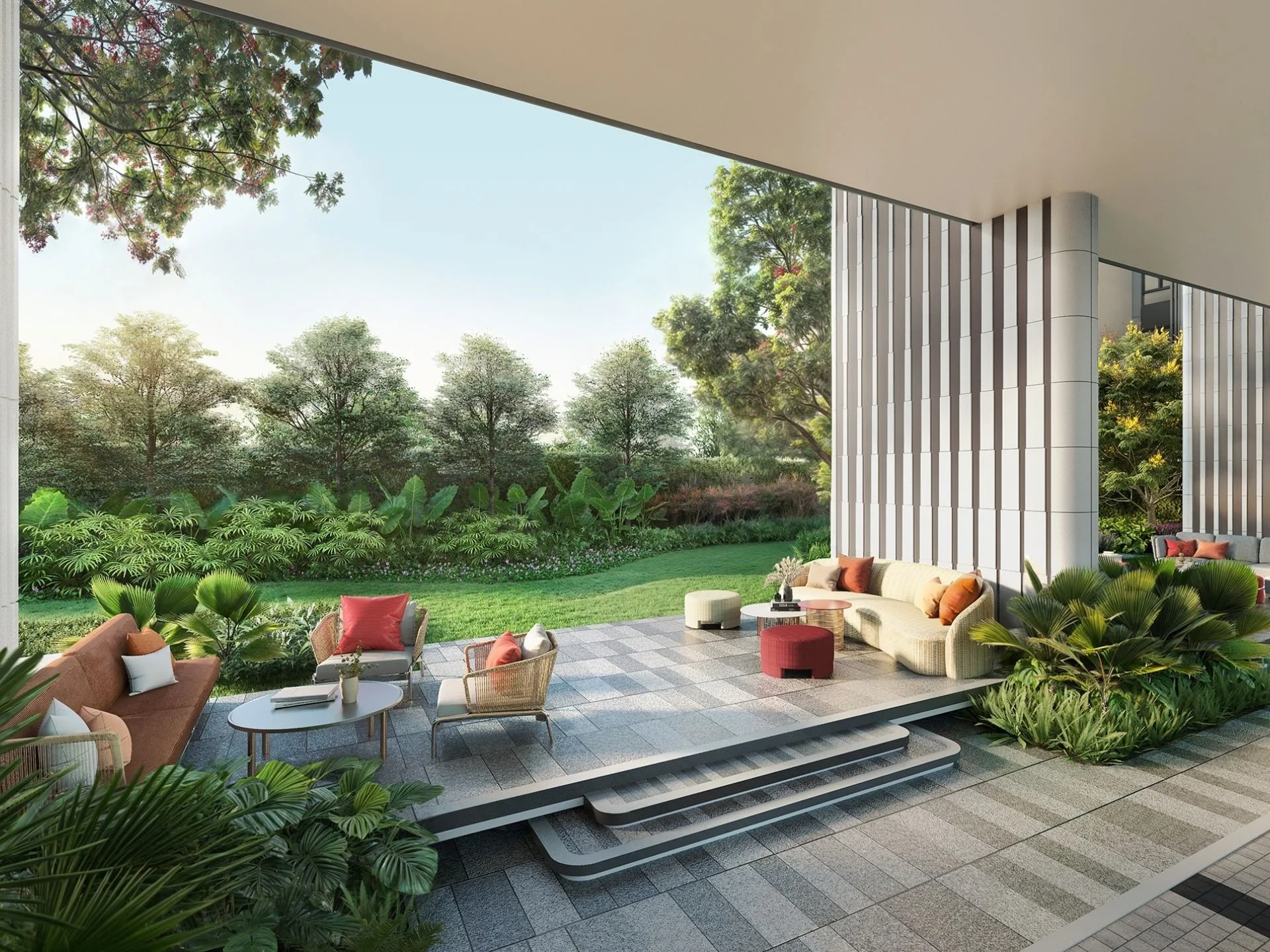 Covered outdoor lounge terrace with wicker seating and landscaped garden at XELF by Sansiri, Khlong Toei, Thailand