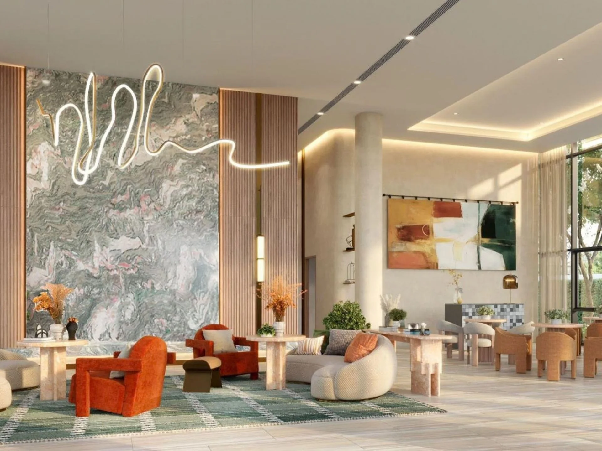 Public lobby lounge with orange armchairs and marble wall at XELF, Thailand