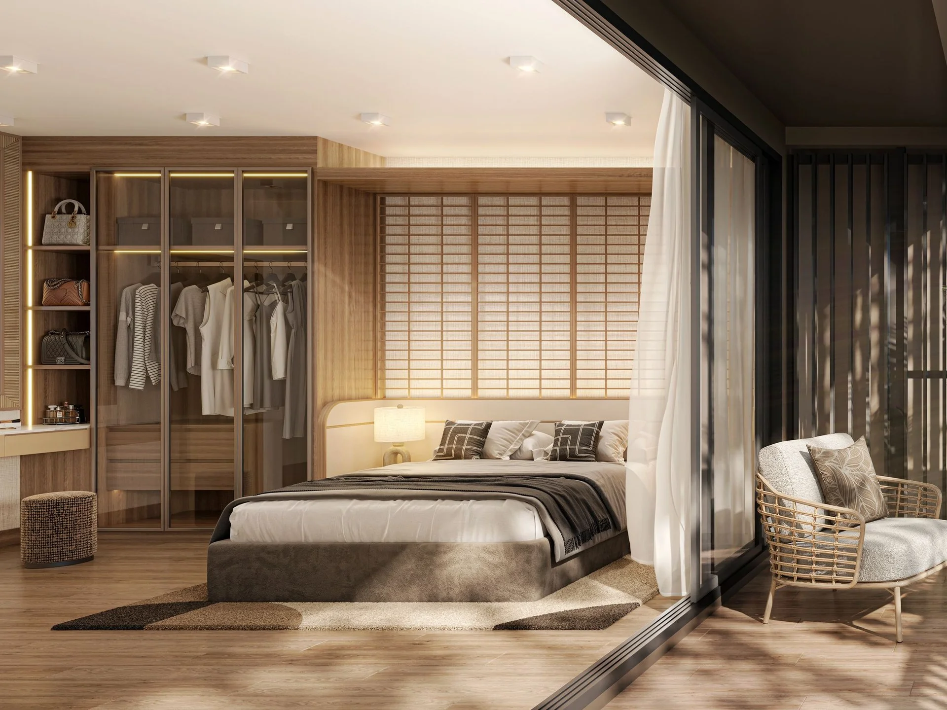 Bedroom interior with wardrobe and rattan armchair in a 1-bedroom apartment at The Astra Samui, Bo Phut, Thailand