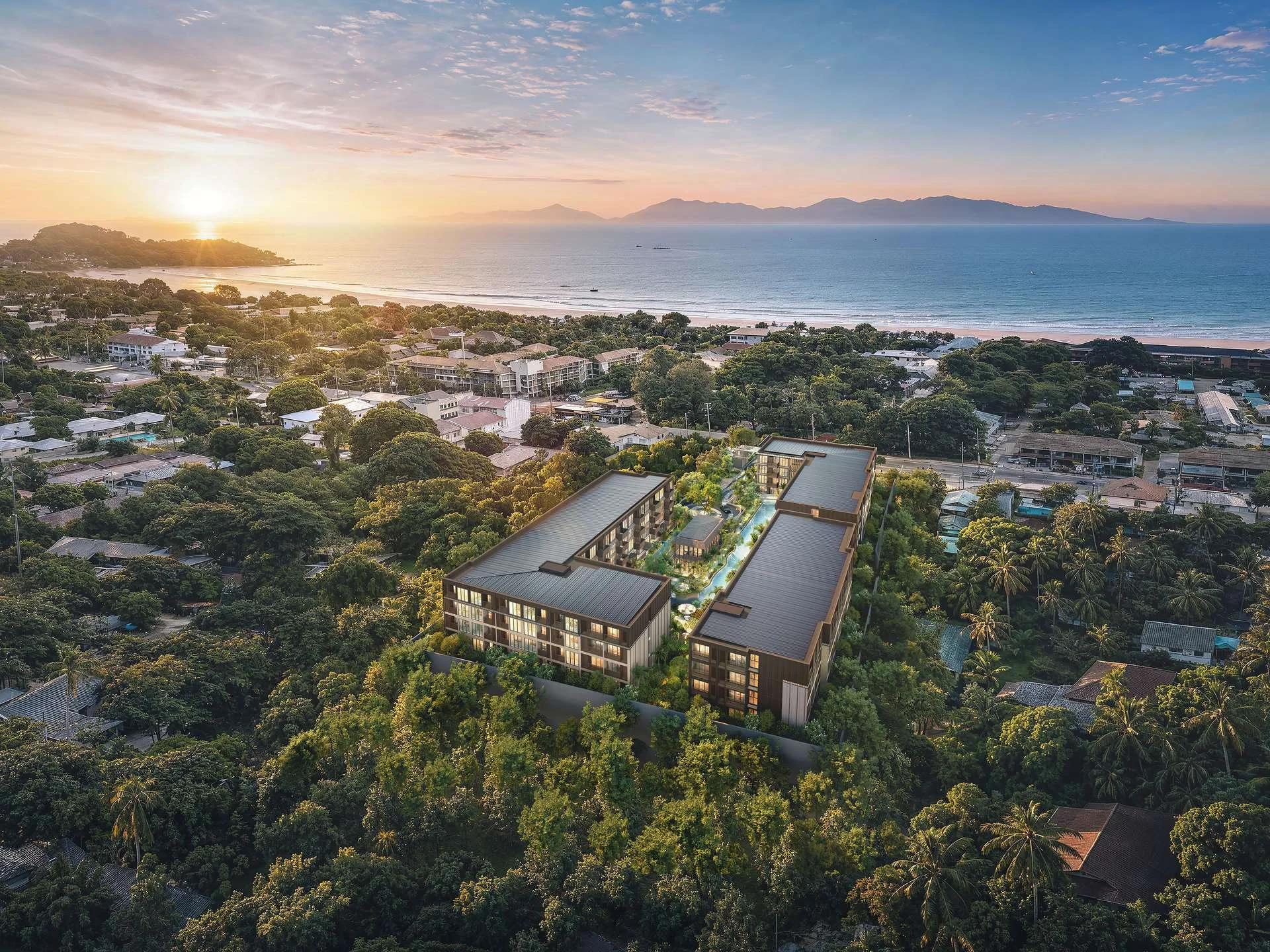 Aerial view of The Astra Samui residential complex with sea and sunset backdrop, Bo Phut, Thailand
