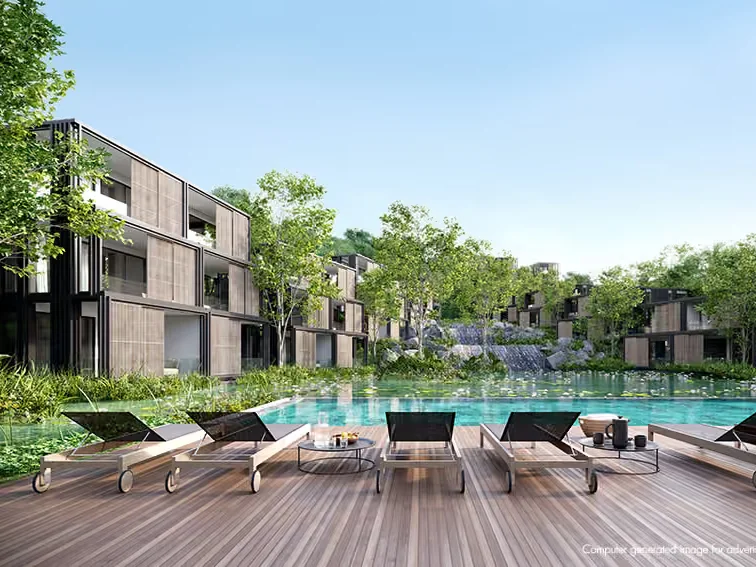MGallery Residences MontAzure swimming pool area with loungers and waterfall, Kamala, Thailand
