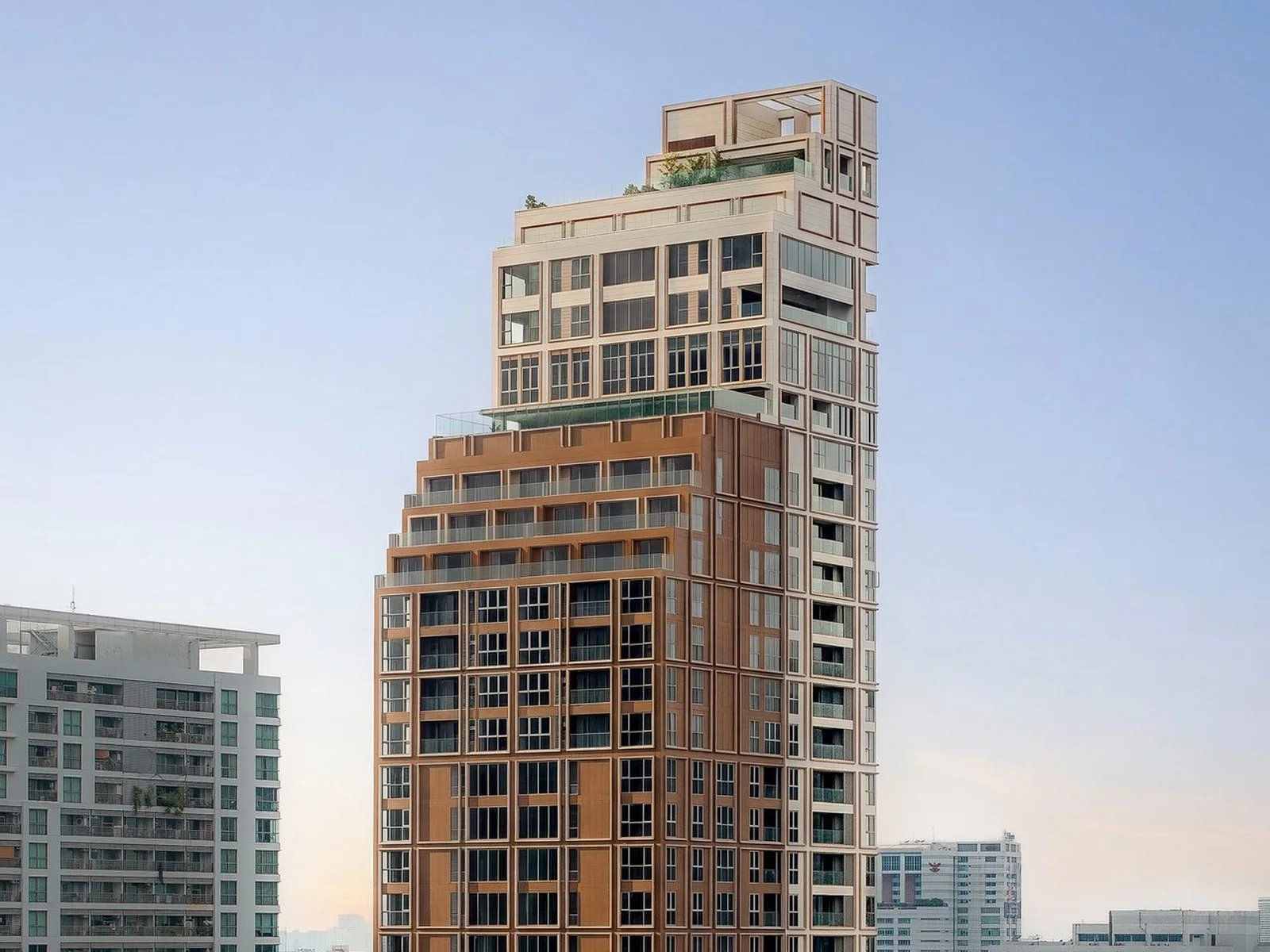 Architecture of Via Ari residence tower with terraced upper floors and rooftop greenery, Ari, Thailand