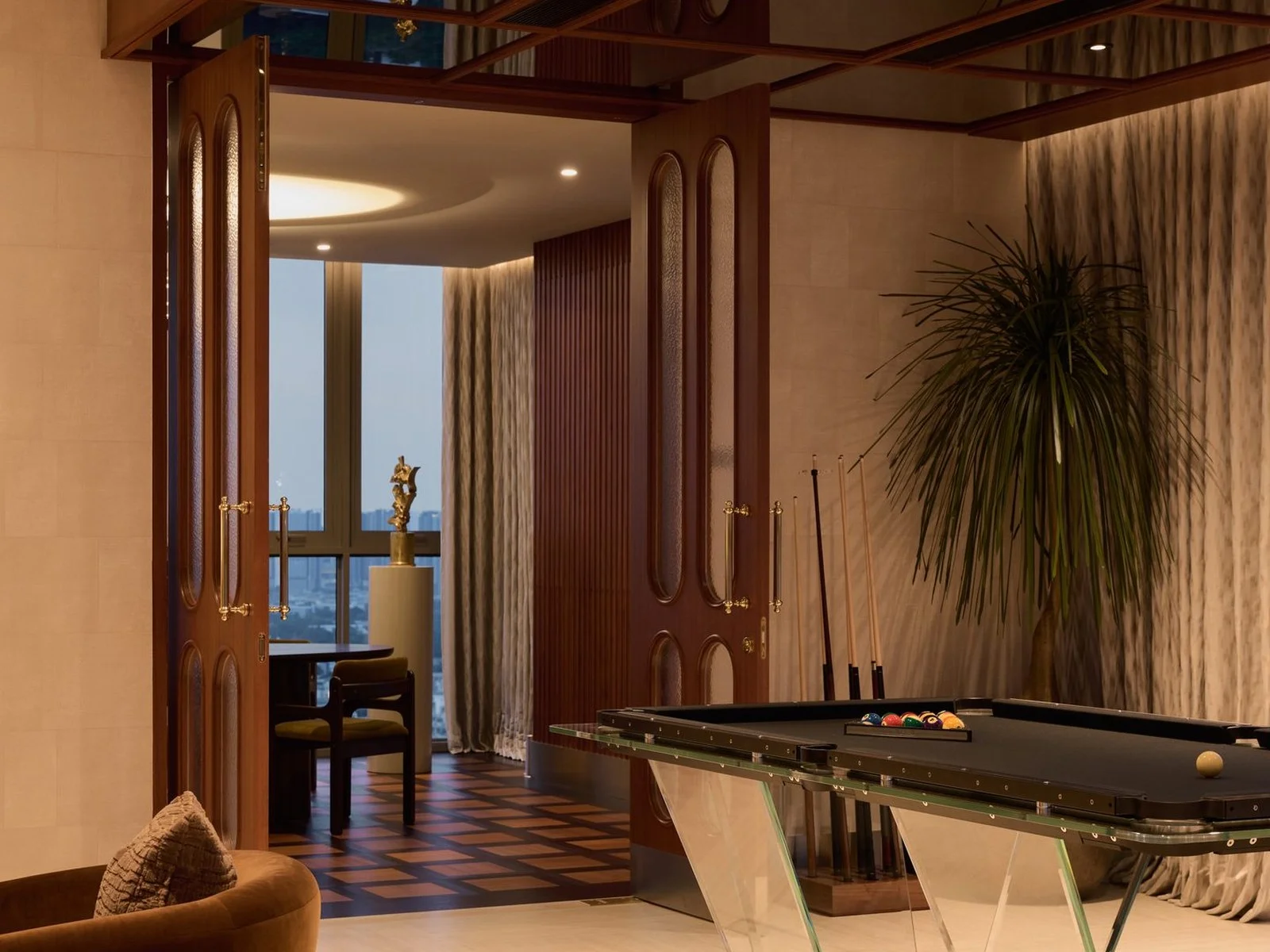 Billiard room interior with pool table in a 2-bedroom apartment at Via Ari, Ari, Thailand