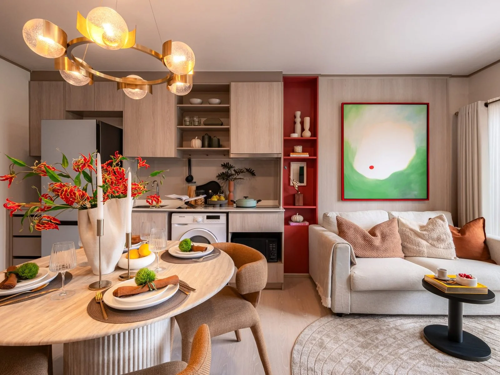 Open-plan living room and kitchen interior in a unit at FLO by Sansiri, Khlong San, Thailand